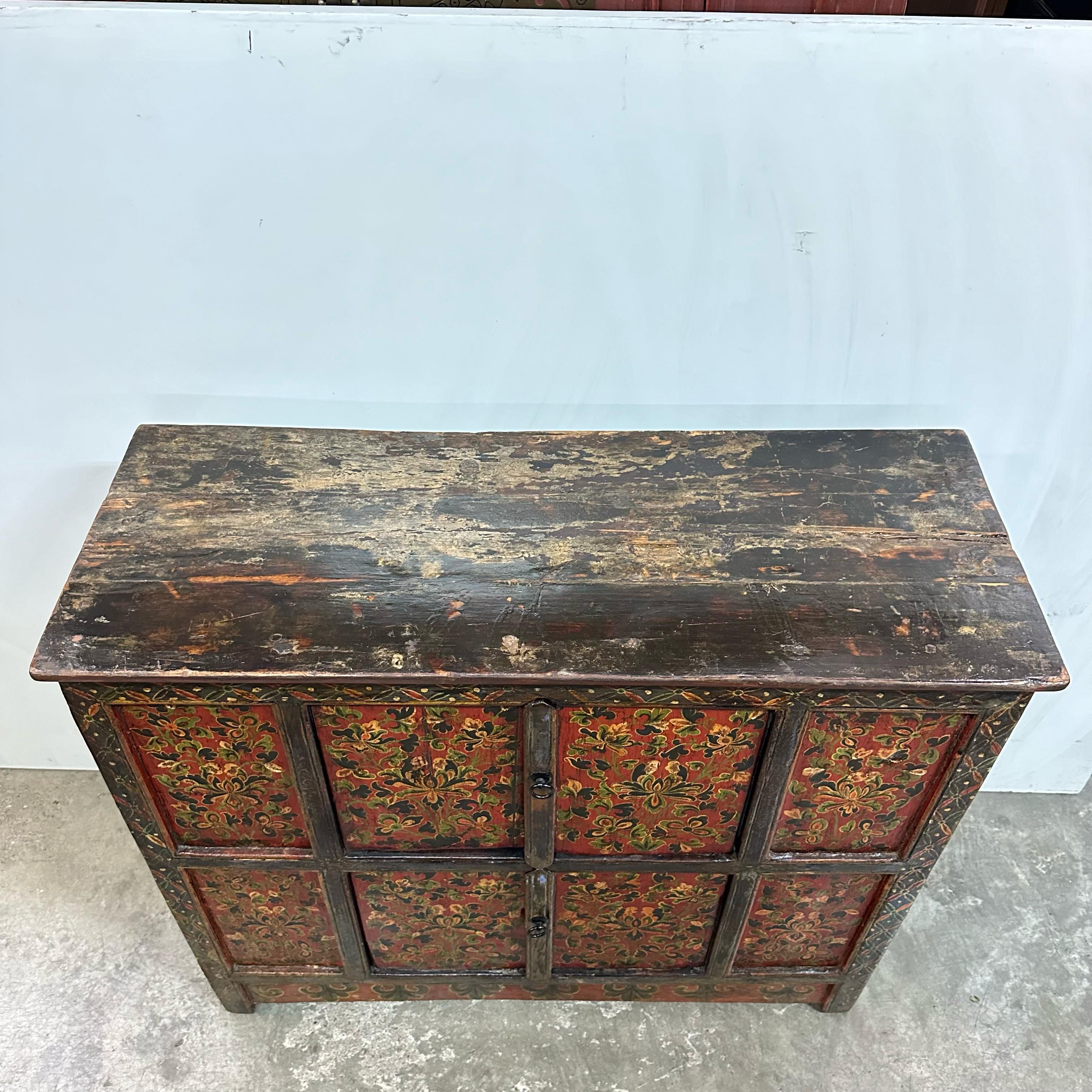 Hand-Painted Tibetan 19th Century Cabinet with Hand-painted Floral Design on Red Background For Sale