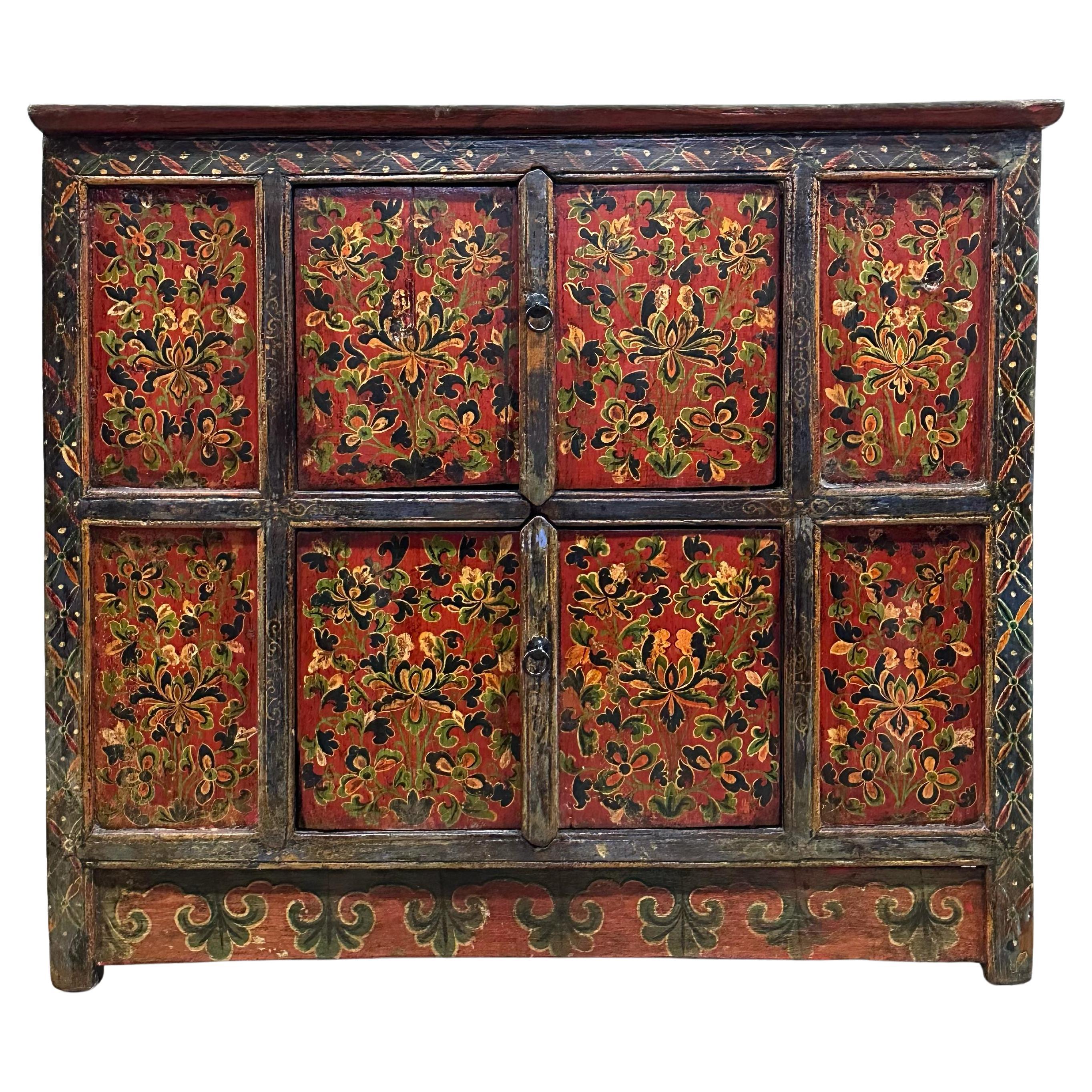 Tibetan 19th Century Cabinet with Hand-painted Floral Design on Red Background