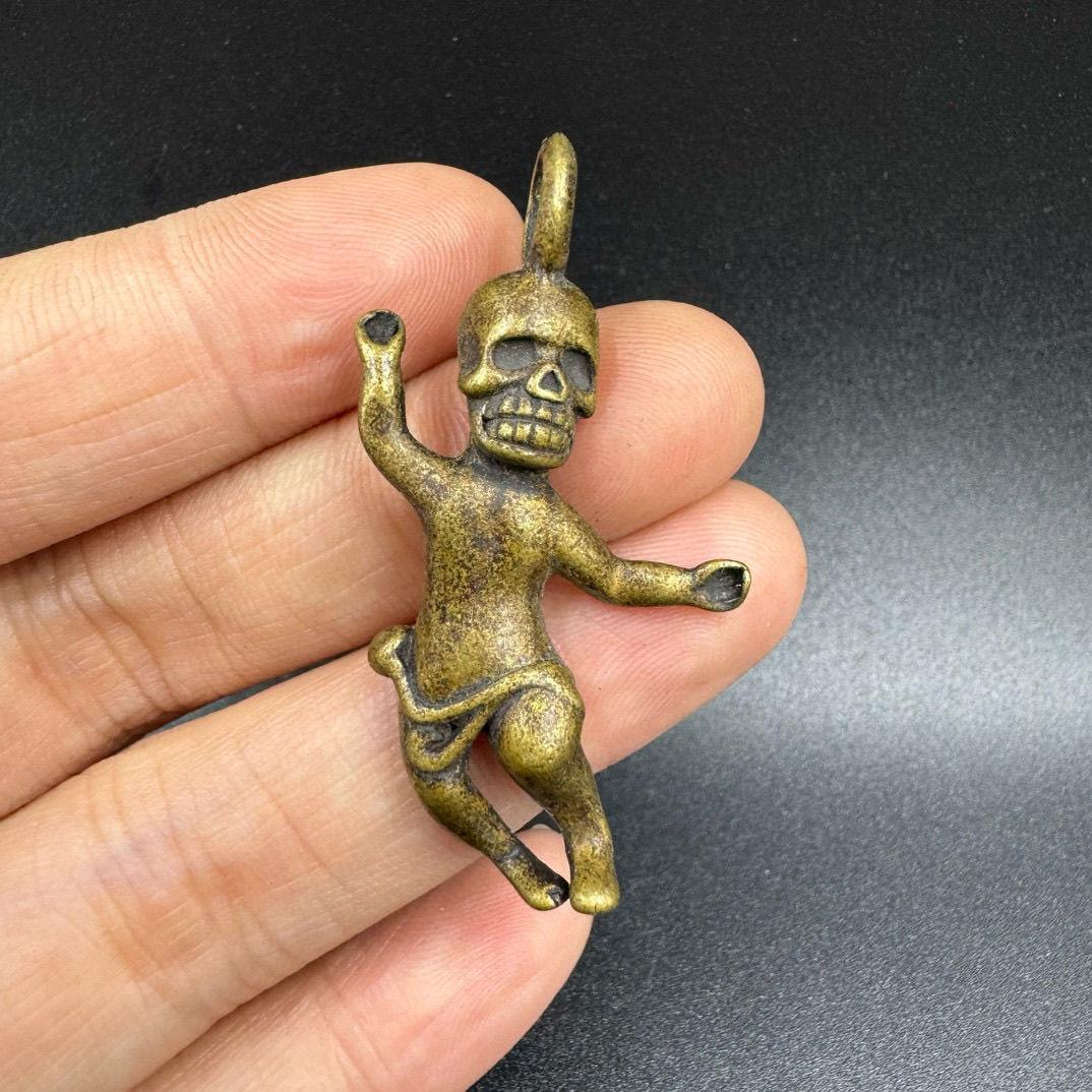 Immerse yourself in the rich spiritual heritage of Tibet with this Tibetan Antique Bronze Religious Figure, a timeless piece of sacred art. Crafted from solid bronze, this intricately detailed statue embodies profound spiritual significance,