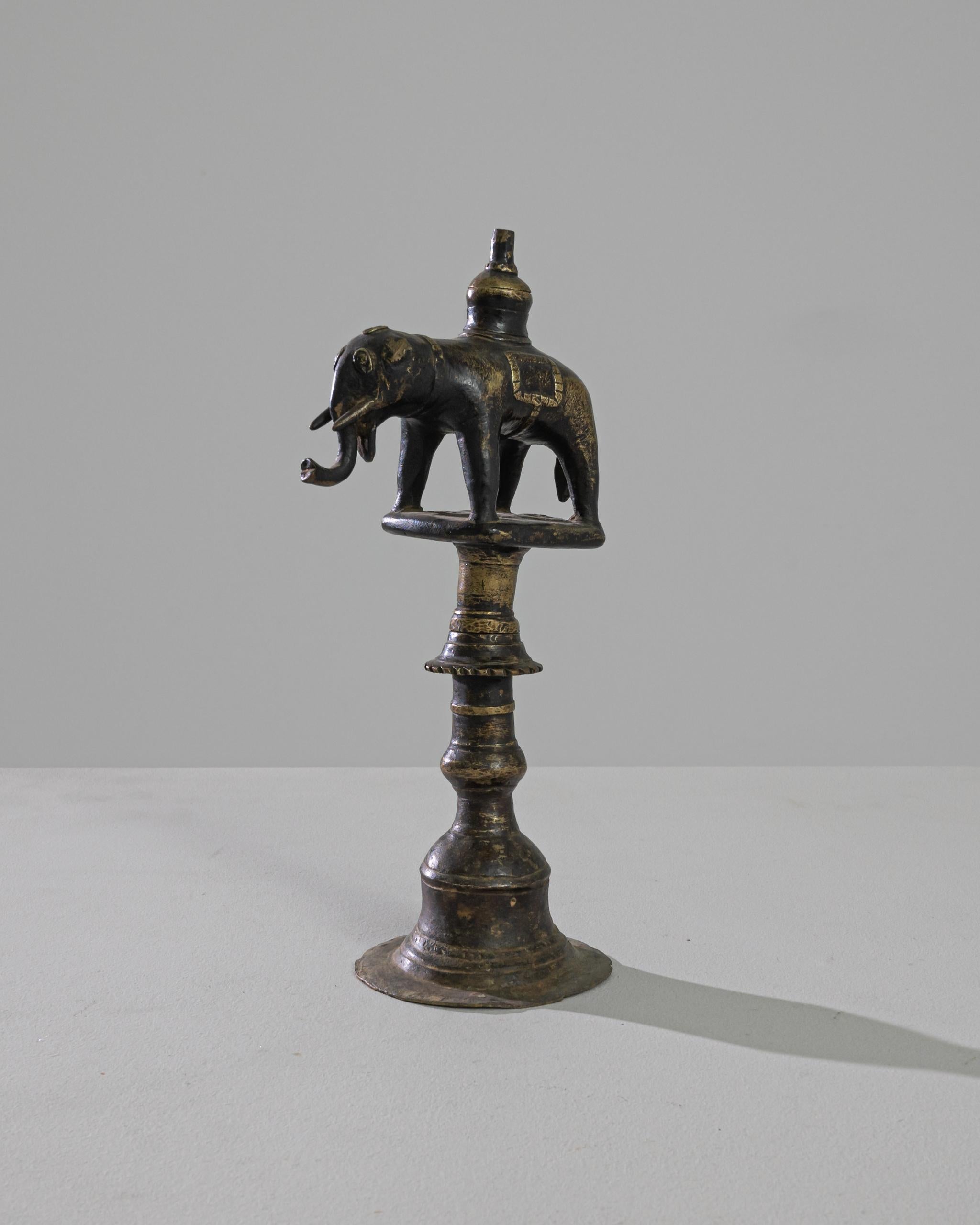 statue oil lamp