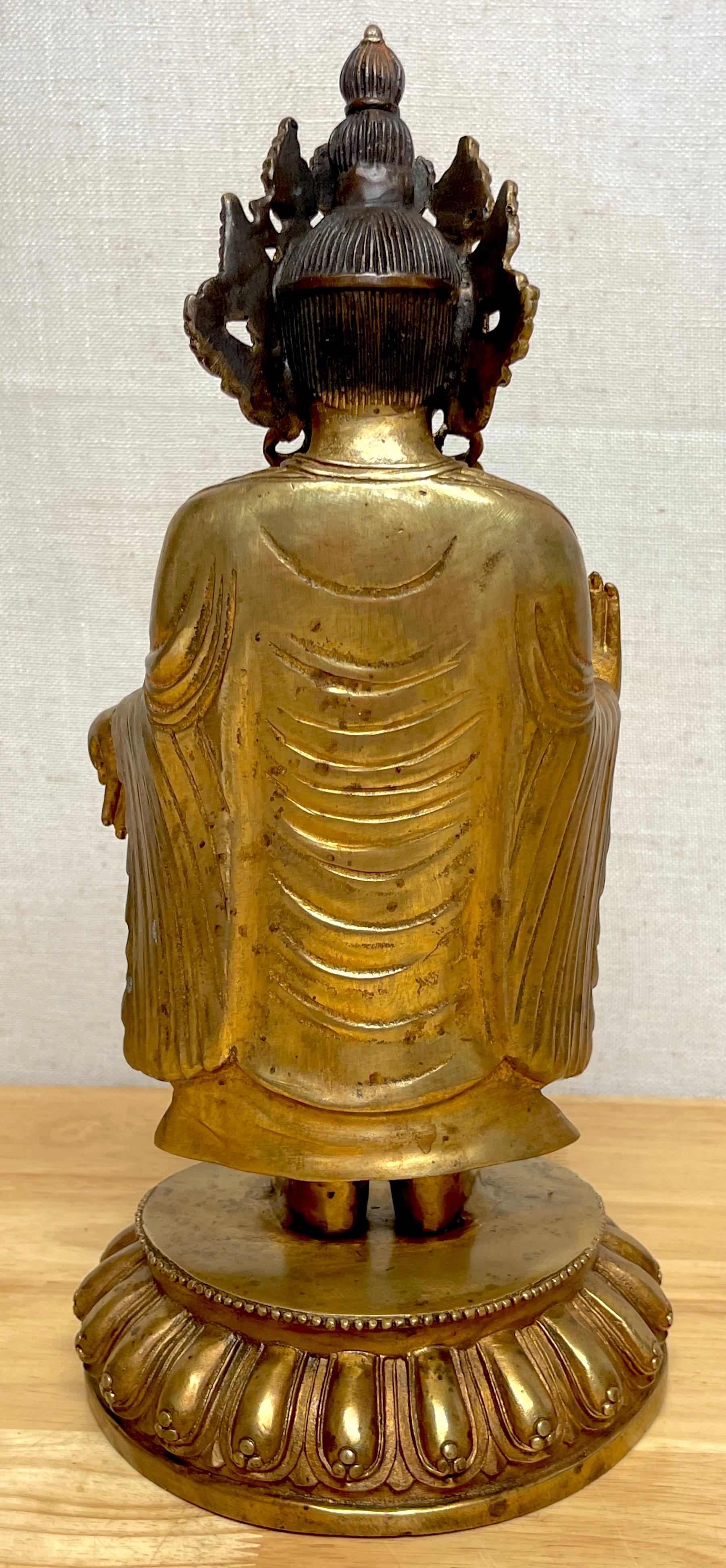 Tibetan Bronze Standing Gilt Bronze Buddha Offering Protection For Sale 3