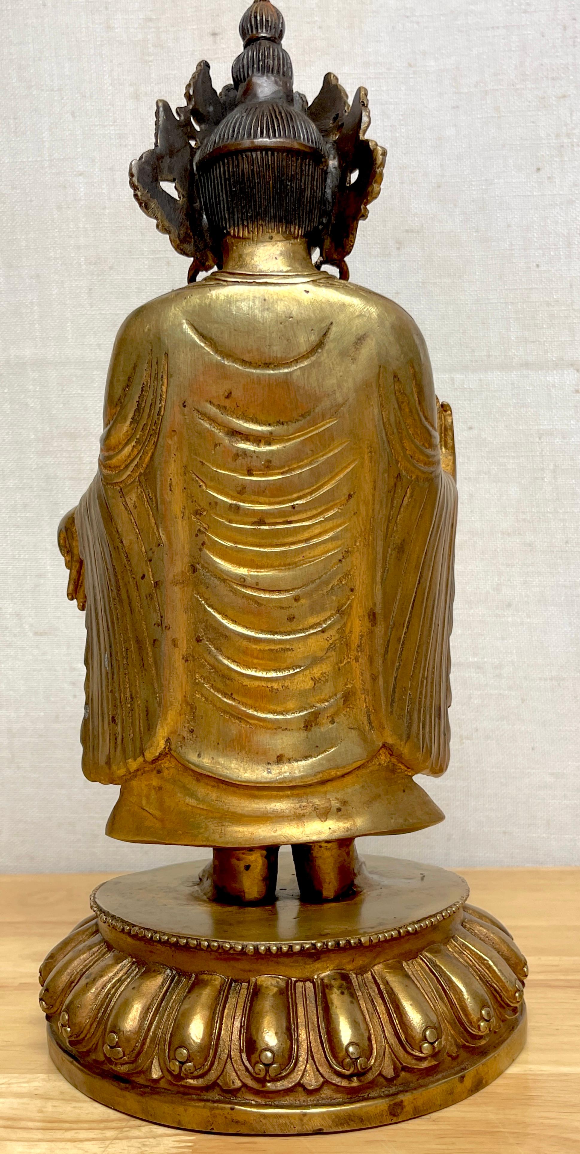 Tibetan Bronze Standing Gilt Bronze Buddha Offering Protection For Sale 4
