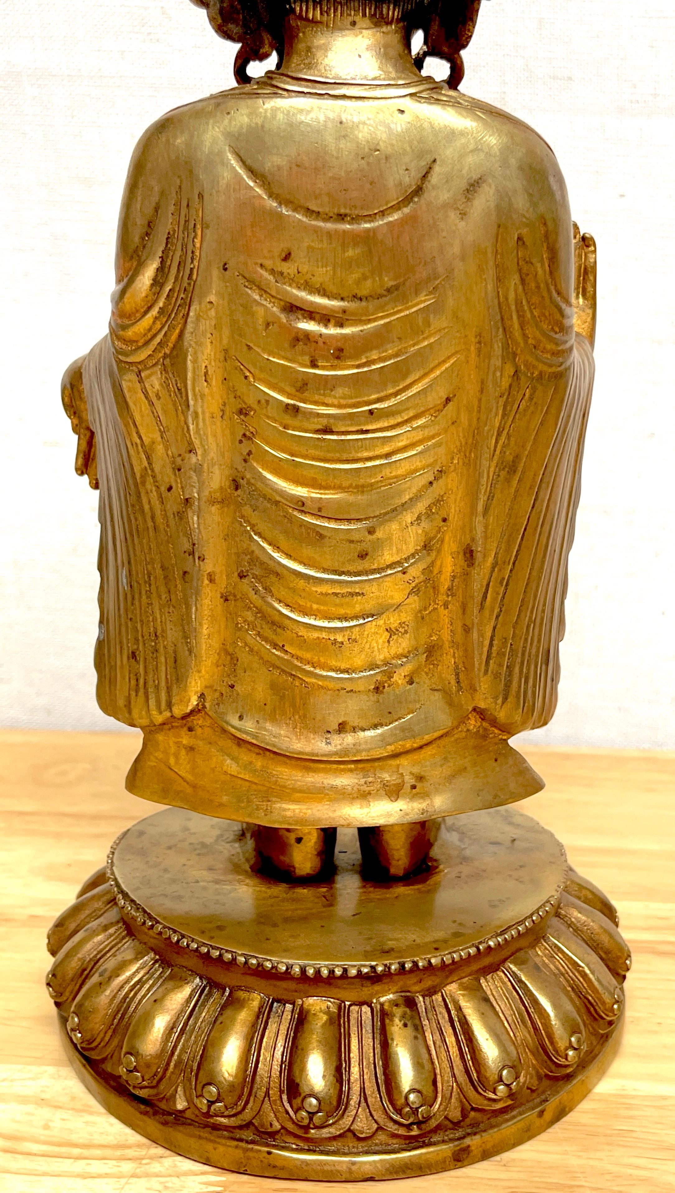 Tibetan Bronze Standing Gilt Bronze Buddha Offering Protection For Sale 6