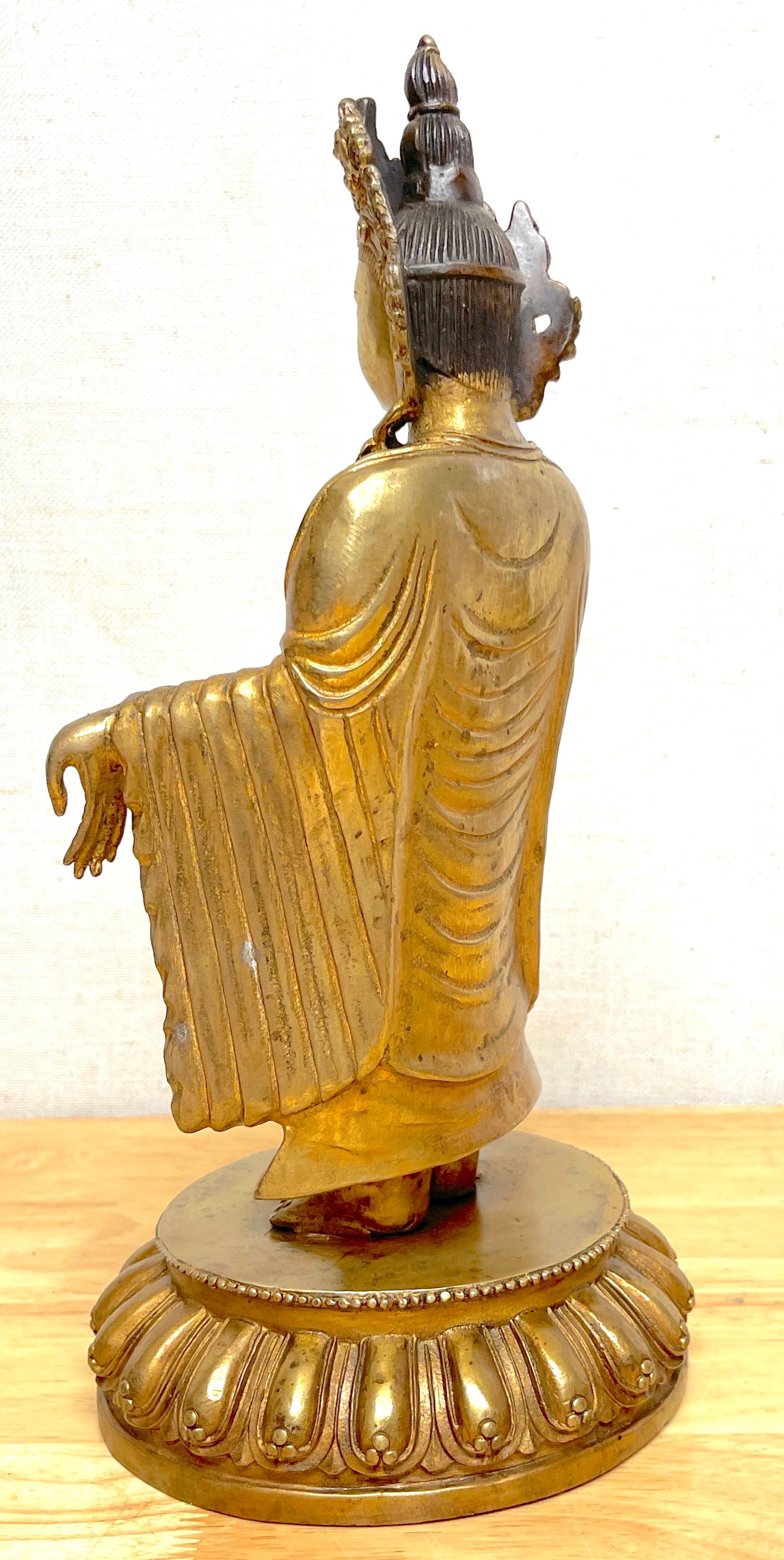 Tibetan Bronze Standing Gilt Bronze Buddha Offering Protection For Sale 7