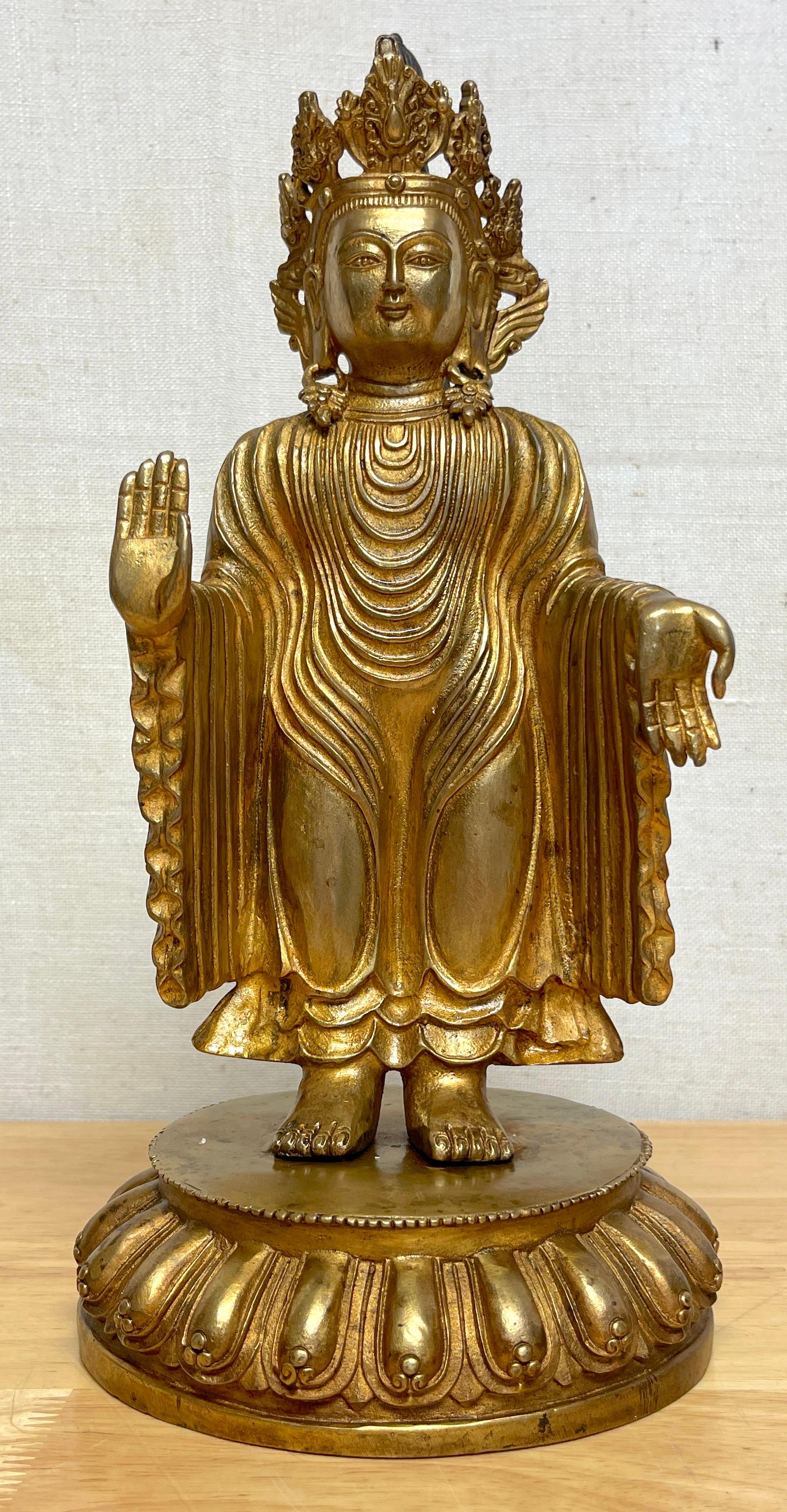 standing buddha offering protection