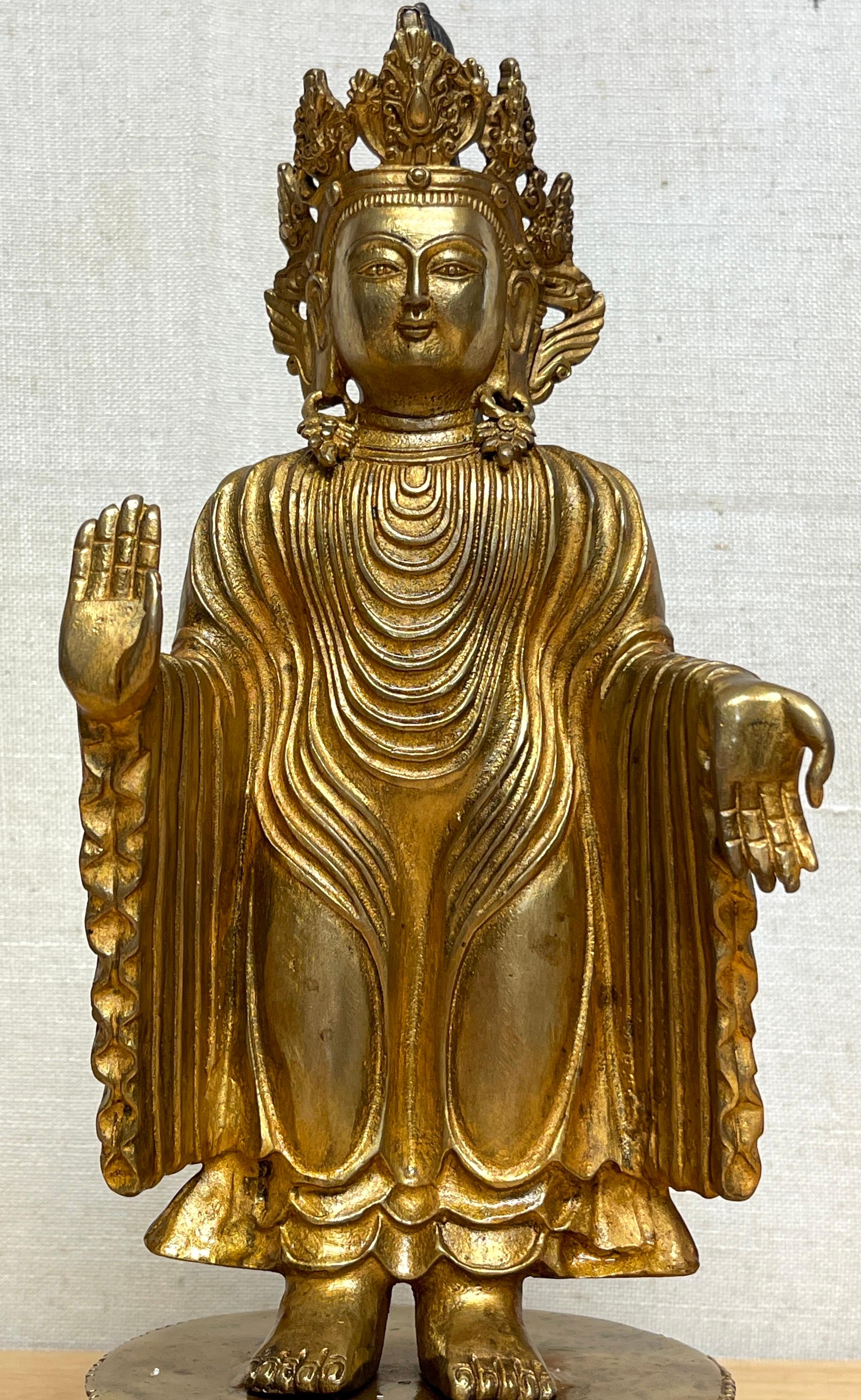 Chinese Export Tibetan Bronze Standing Gilt Bronze Buddha Offering Protection For Sale