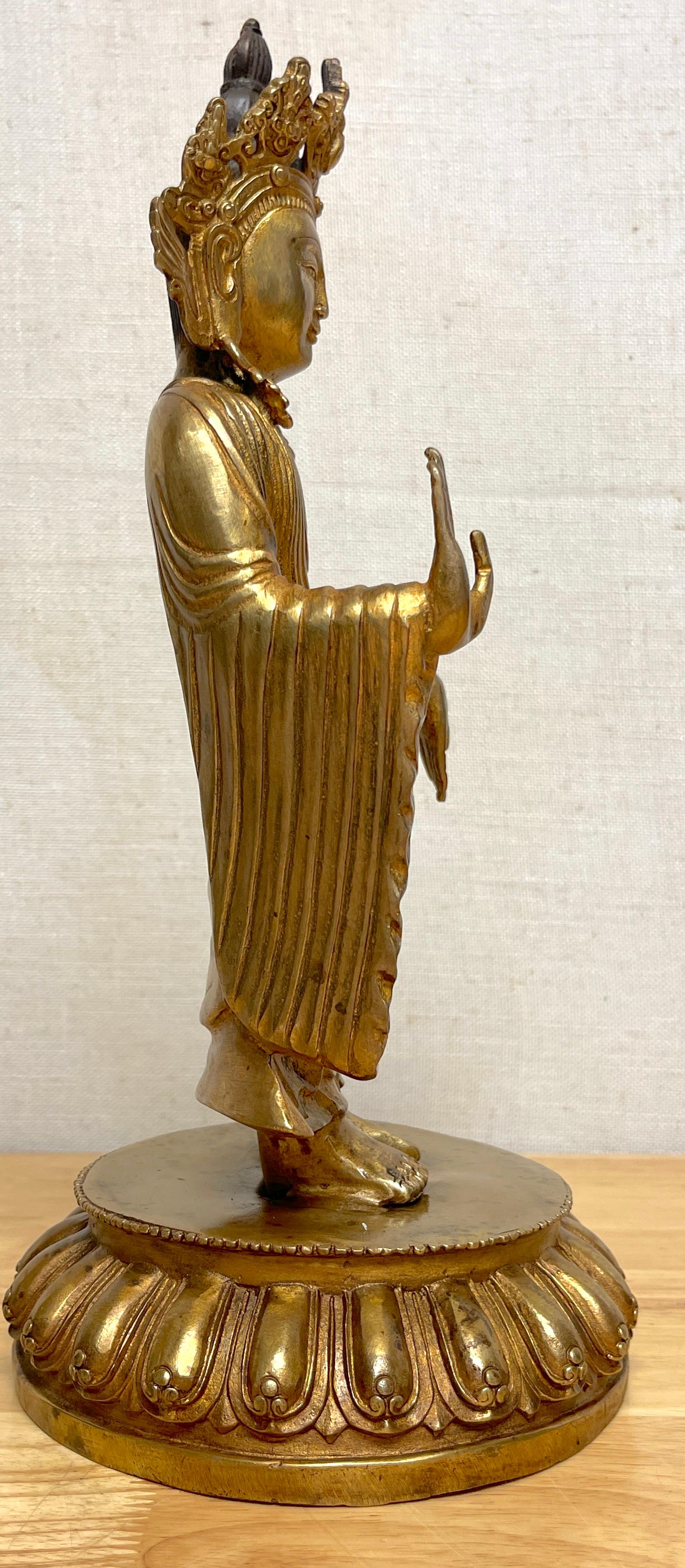 Tibetan Bronze Standing Gilt Bronze Buddha Offering Protection For Sale 1
