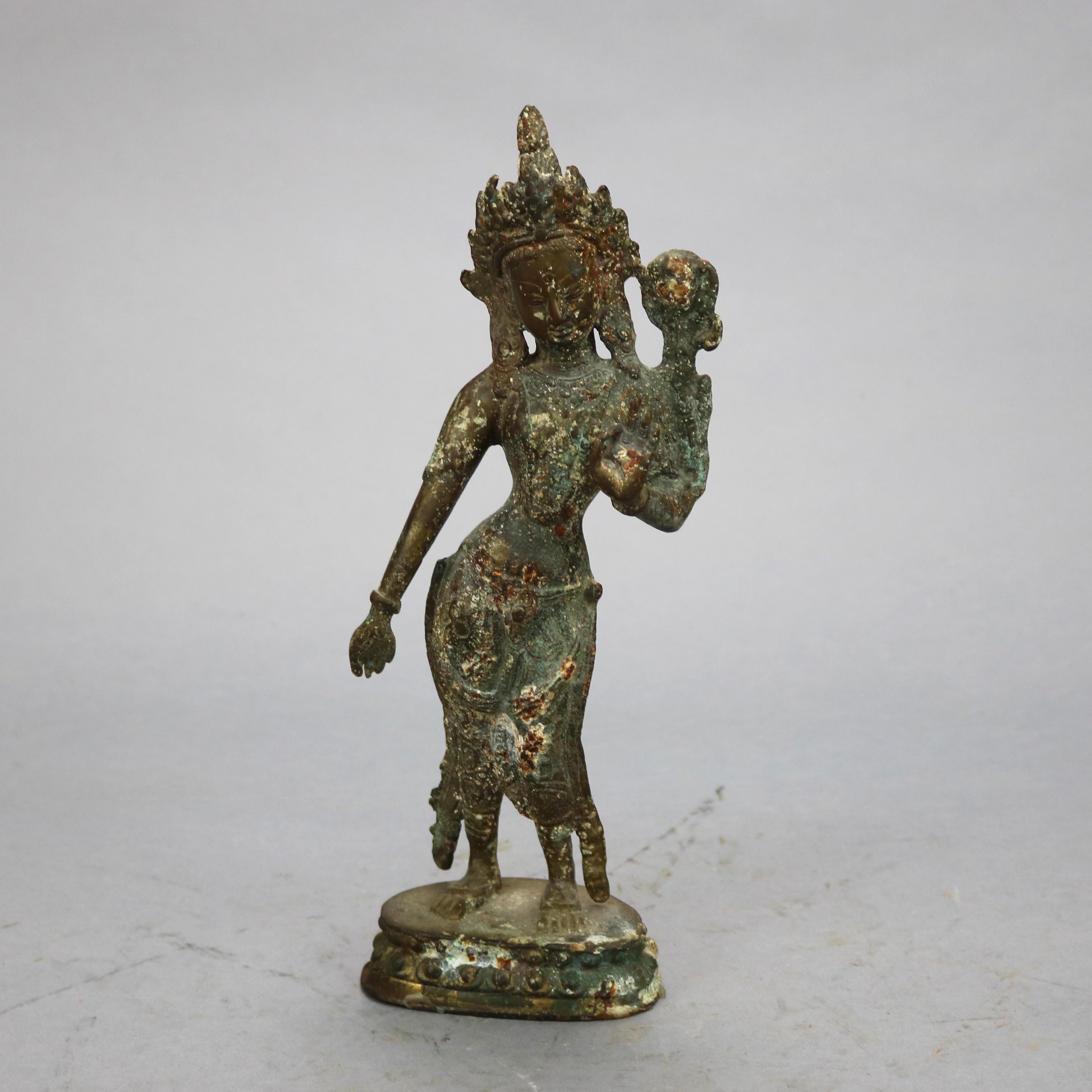 A Tibetan cast bronze dancing Shiva Buddha sculpture, 20th century

Measures - 12'' H x 4.25'' W x 3'' D.