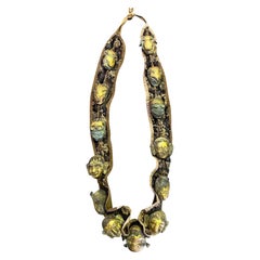 Ceinture de cérémonie tibétaine avec dix têtes ornementales en bronze, 18ème siècle