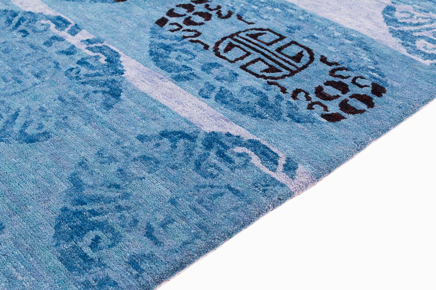 Lana Tappeto a rotelle Tibetan Coin Medallion Indigo Wool Handmade Small Runner Rug di Joseph Carini in vendita