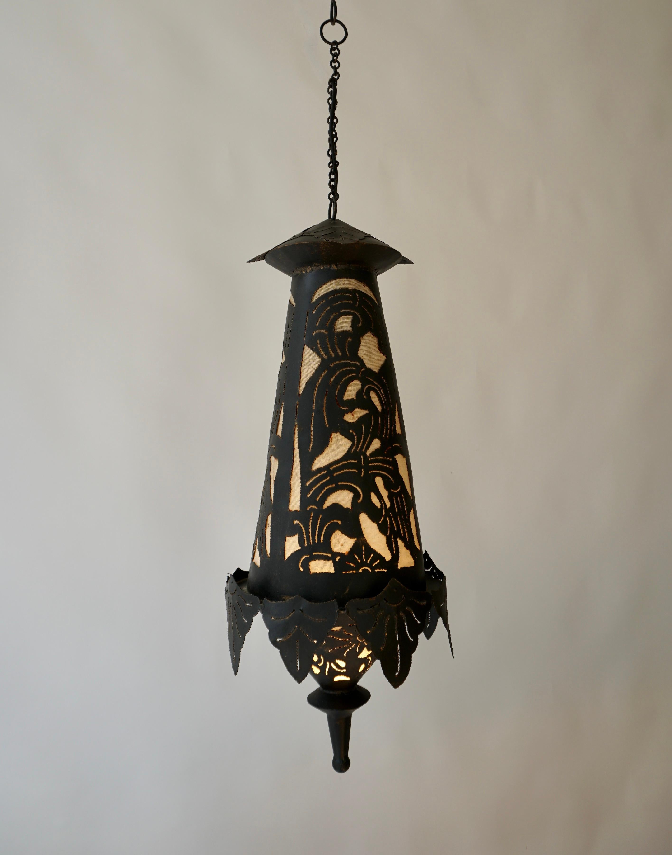 Beautiful Tibetan copper hanging lamp or lantern in a conical shape, covered with textile on the inside to provide a warm light.

Diameter 10.2