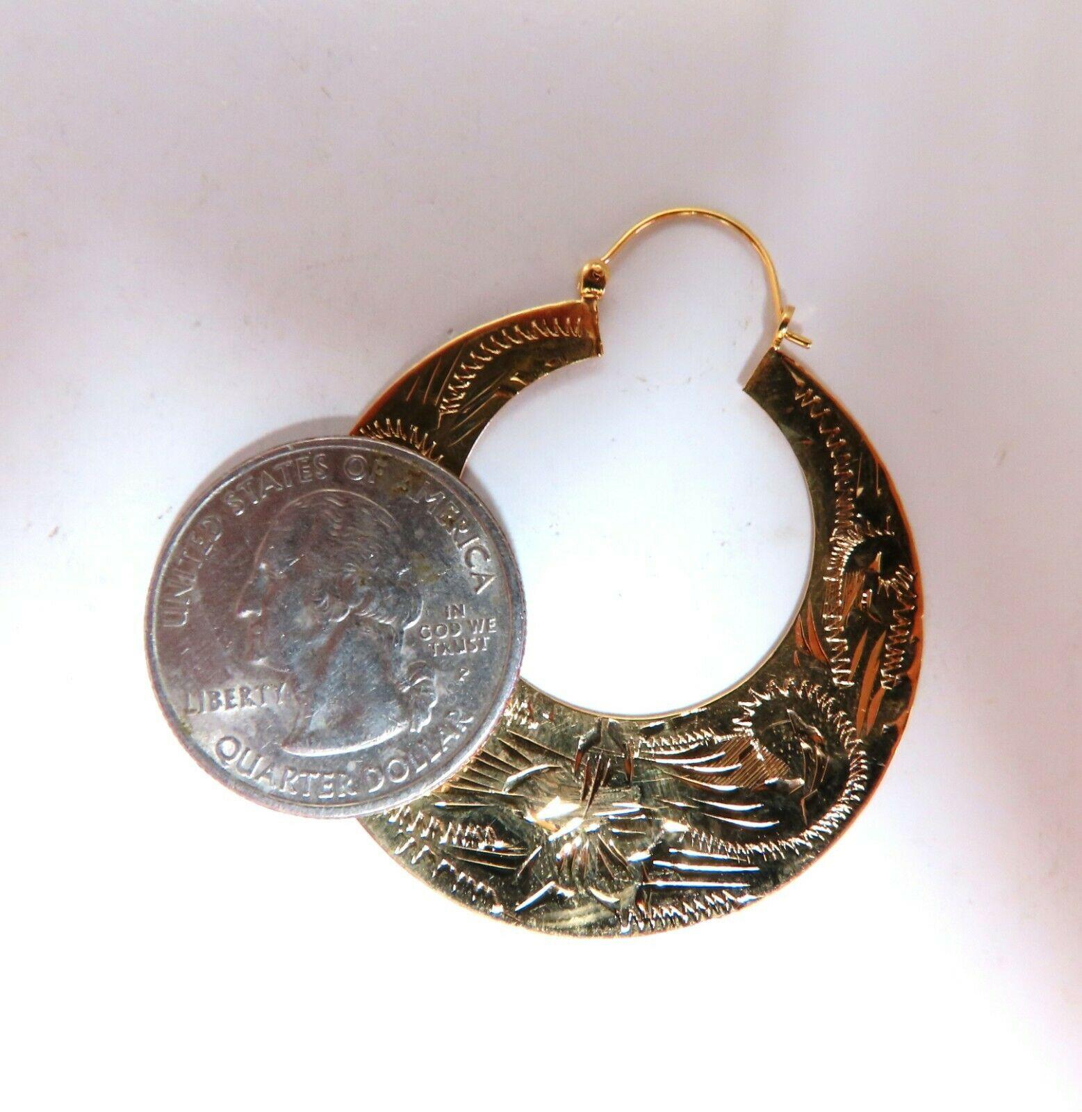 Graver Carved Tibet Crescent Deco Earrings

Intricate Carvings

1.6 inch Diameter

Comfortable Lever Post Clip

7.6 grams / 14kt. Yellow Gold

Earrings are gorgeous made