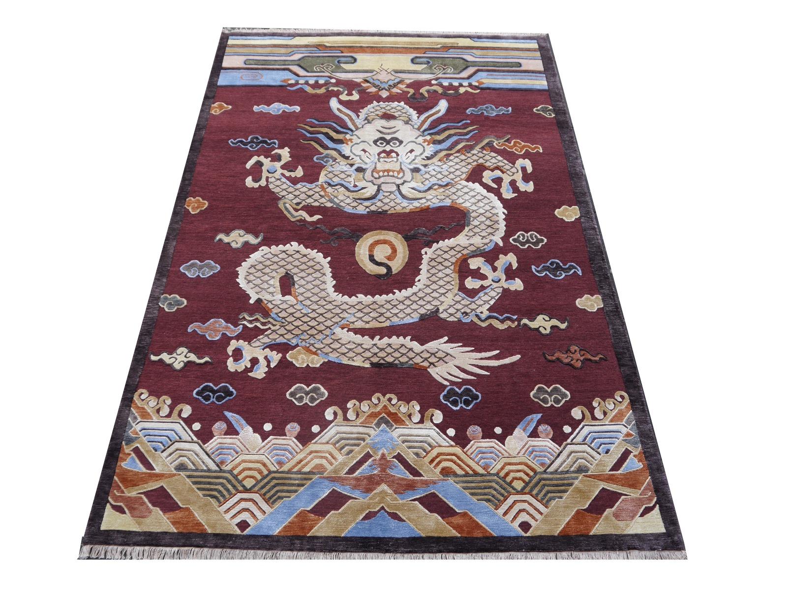 Tibetan Dragon design rug with wool and silk pile in style of Antique Imperial Chinese Kansu carpets 8 x 5.4 ft.

A beautiful contemporary dragon design rug, hand knotted using finest Chinese mulberry silk (60%) and Tibetan highland wool