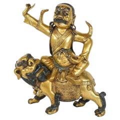 Tibetan Gilt Bronze Sculpture of Vajra Sadhu or Dorje Legpa on his lion Antique Tibetan Gilt Bronze Sculpture of Vajra Sadhu or Dorje Legpa on his lion