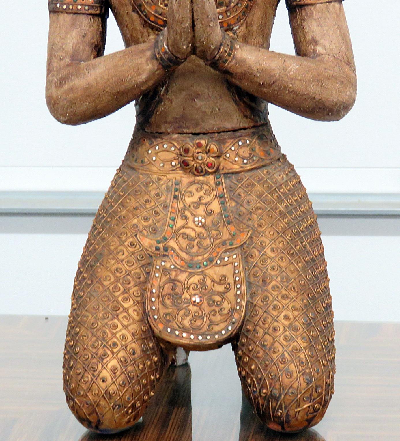 Carved Tibetan goddess statue.