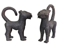 Tibetan Guardian Leopards, a Matching Pair of Patinated Bronze Sculptures
