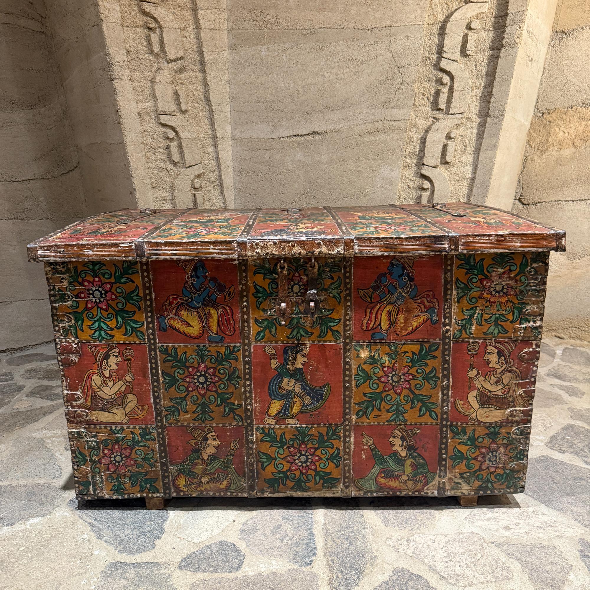 For your consideration, a Tibetan monastery hand painted traveling chest. Solid wood in rectangular  shape. Beautiful decoration in bright vivid colors. Antique nail construction. Firm and sturdy. Forged iron hardware. 

Dimensions: 28.88