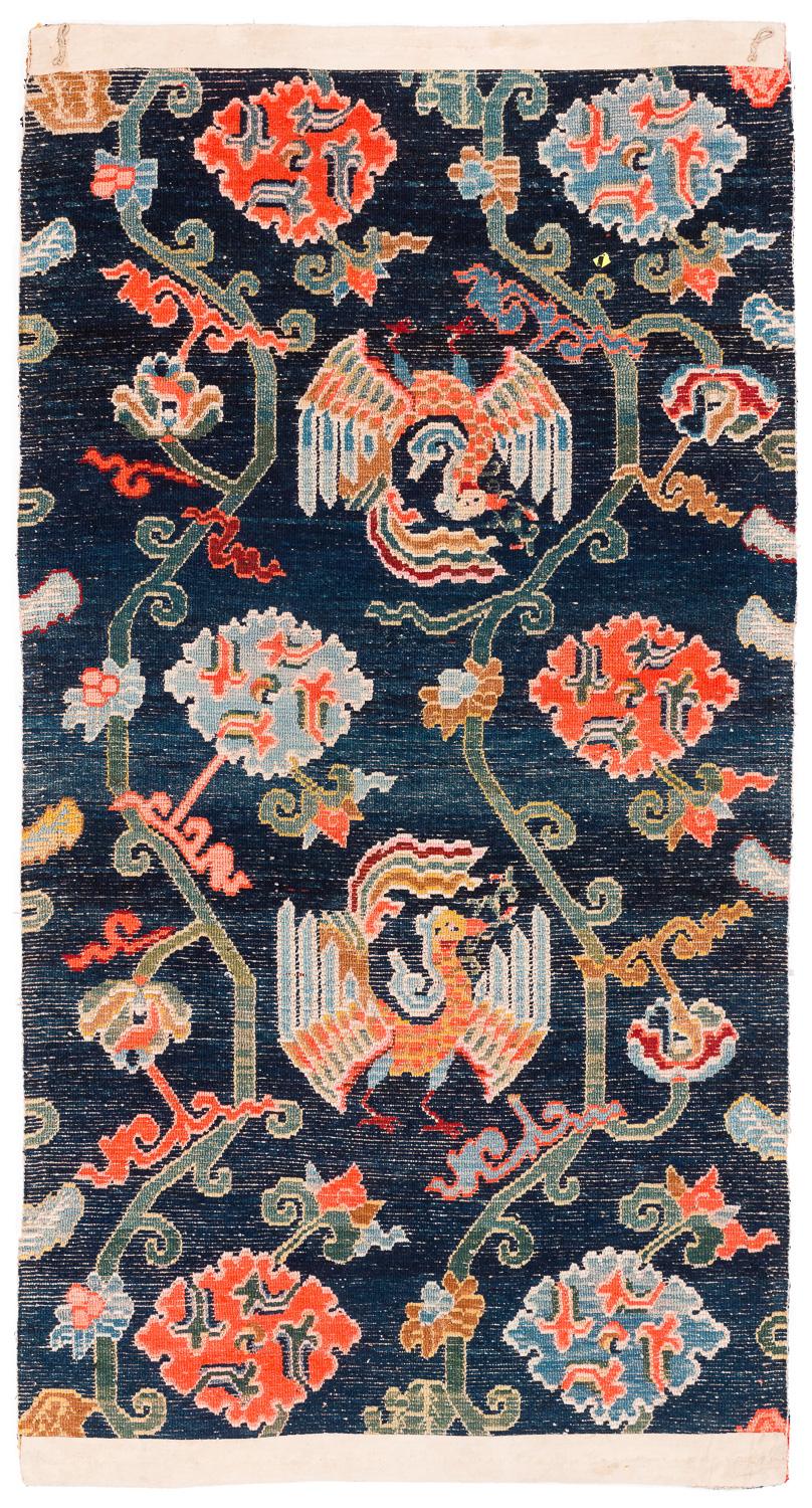 This carpet is made with very silky lustrous wool and is probably woven using lambs wool, that's how silky it is! It has fabulous jewel tone vegetable dyes and is all natural. Measures: 2'10'' x 5'7''.

The rug has some very unusual features in