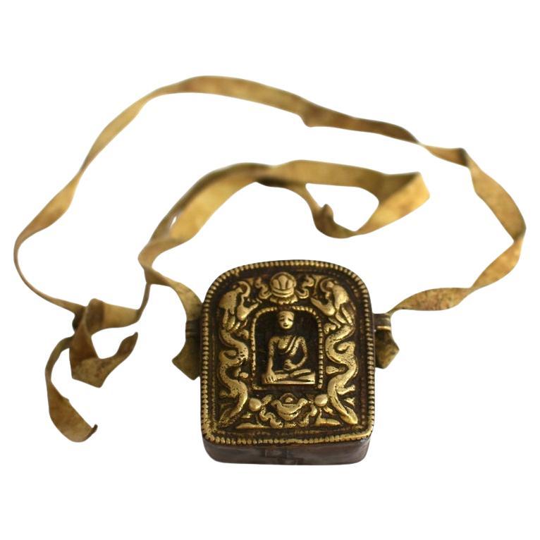 Tibetan Protection Amulet Gau Box with Seated Buddha Relief For Sale