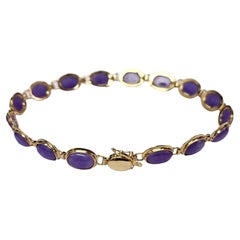 Bracelet tibétain perlé de jadéites violettes et lavandes (avec or jaune massif 14 carats)