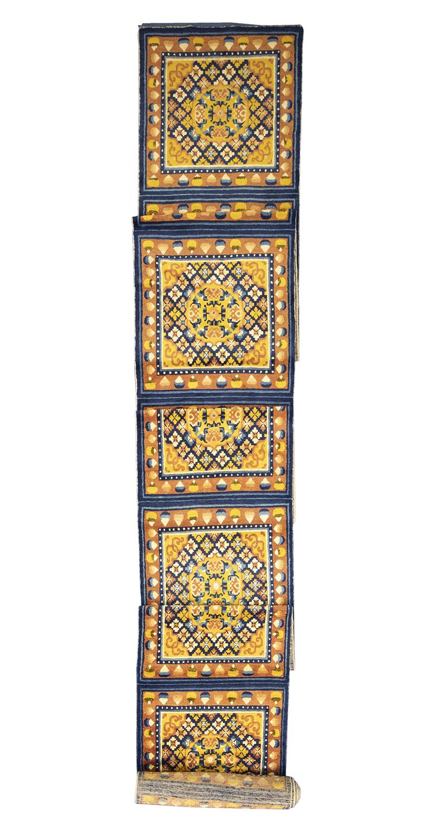 This is a truly remarkable Tibetan Rug Antique Buddhist temple with a special and unique design that embodies the rich spiritual heritage and cultural significance of Buddhism. This extraordinary piece stands out for its amazing craftsmanship,