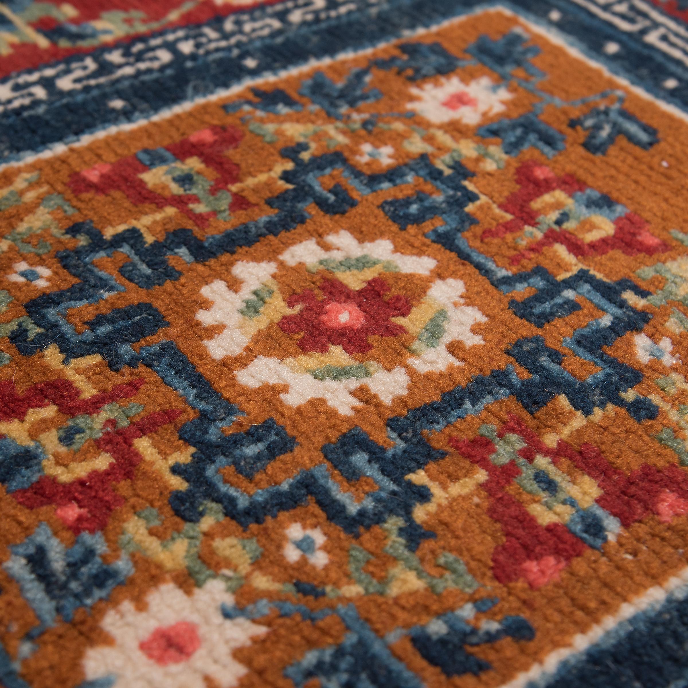 Vegetable Dyed Tibetan Saddle Carpet with Floral Medallion, c. 1900 For Sale