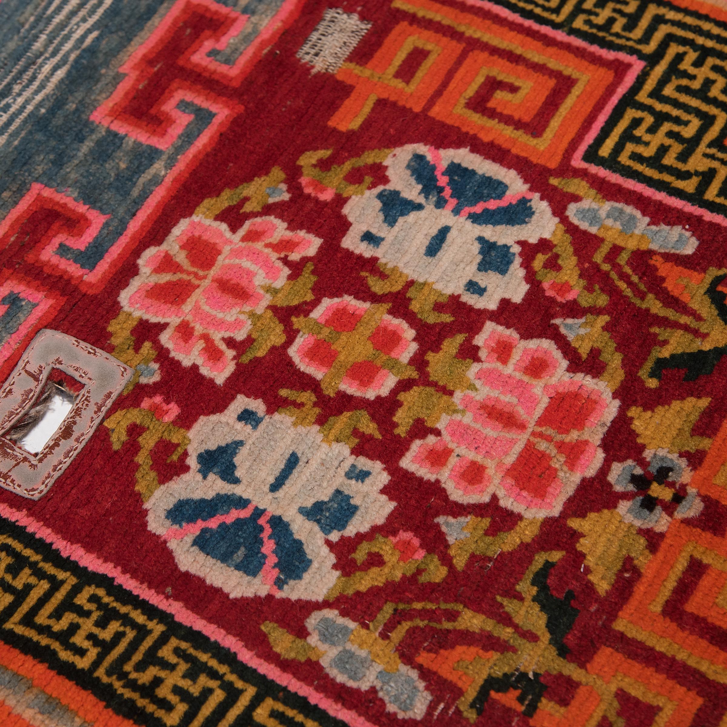 Vegetable Dyed Tibetan Saddle Carpet with Floral Medallions, c. 1930 For Sale