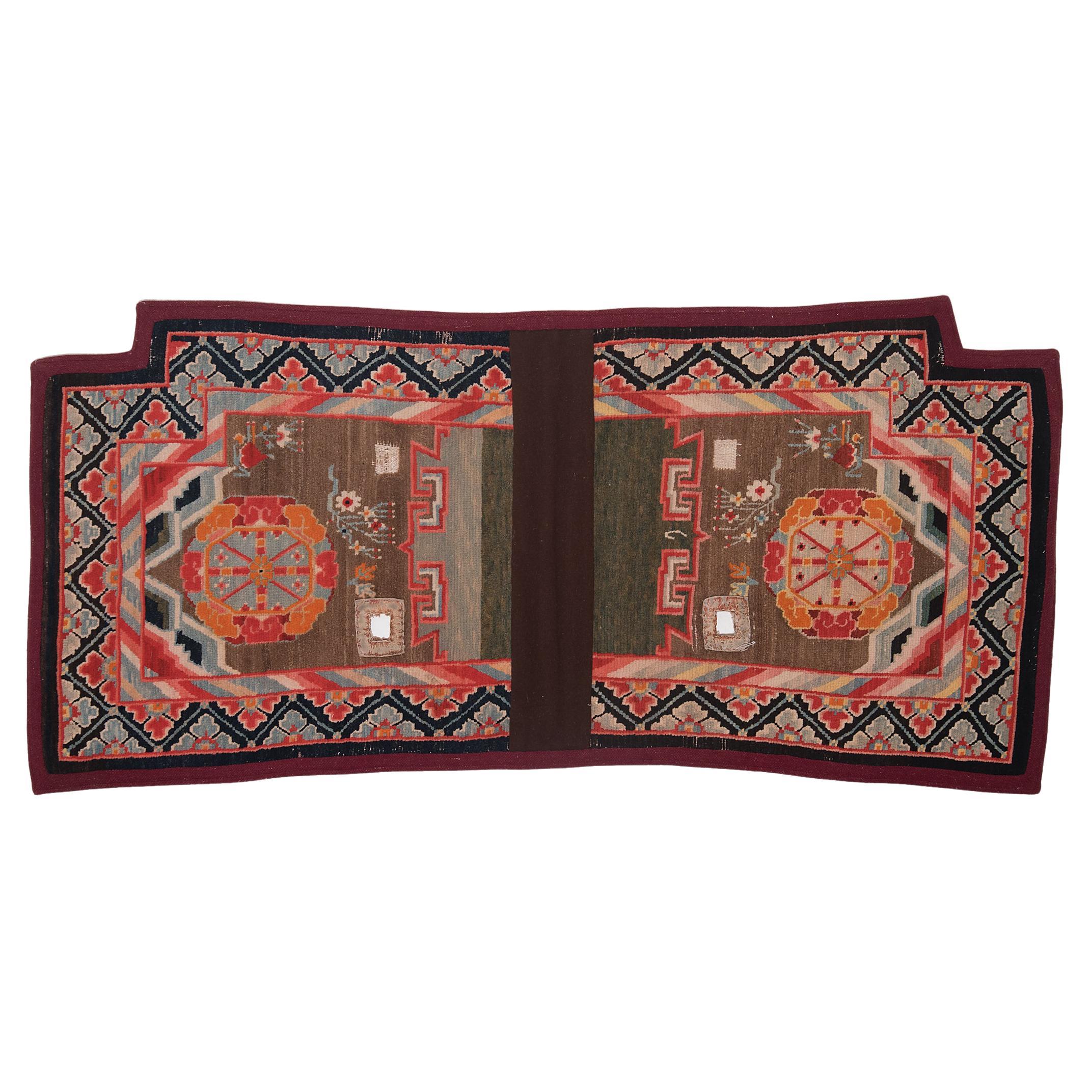 Tibetan Saddle Carpet with Wheel of Life Medallions, c. 1900 For Sale