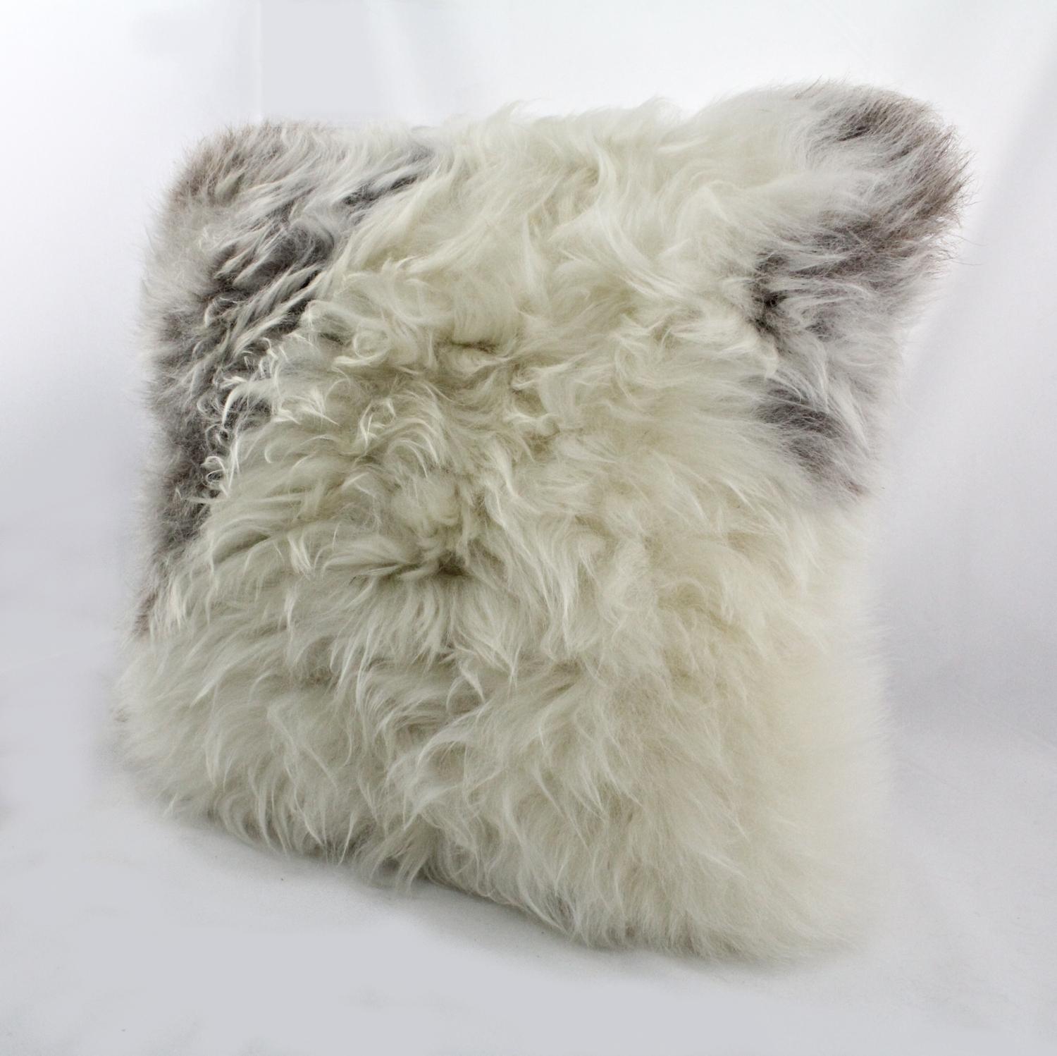 Create an atmosphere of cozy comfort layering a chair or sofa with this alluring shaggy wool, sheepskin pillow. Handcrafted from high quality Tibetan sheepskin preserving the natural beauty of the woolen fleece and earthy tones that bring warmth to