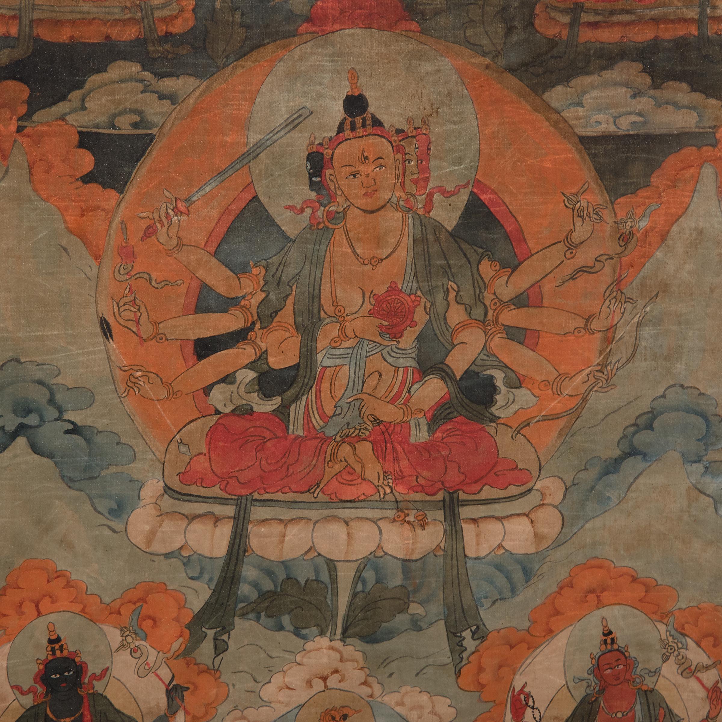 In Buddhist Tibet, patrons and monks commissioned thangka art, or sacred painting, to focus their meditations and prayers. Painted with blue, orange, and red pigments, this 19th century thangka depicts Chenresi, the Buddha of Infinite Compassion and
