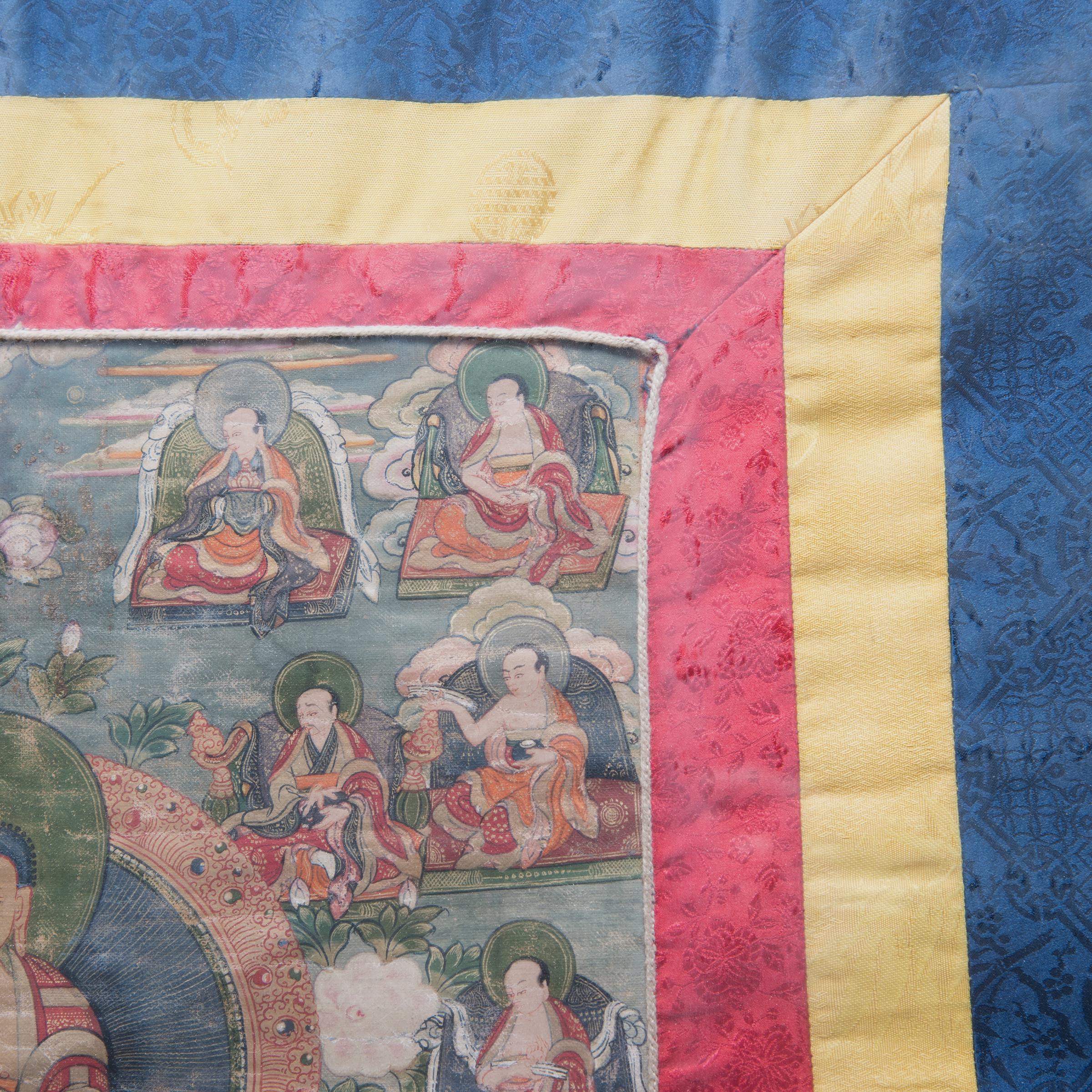 Hand-Painted Tibetan Thangka of Sakyamuni with Silk Brocade, C. 1880 For Sale
