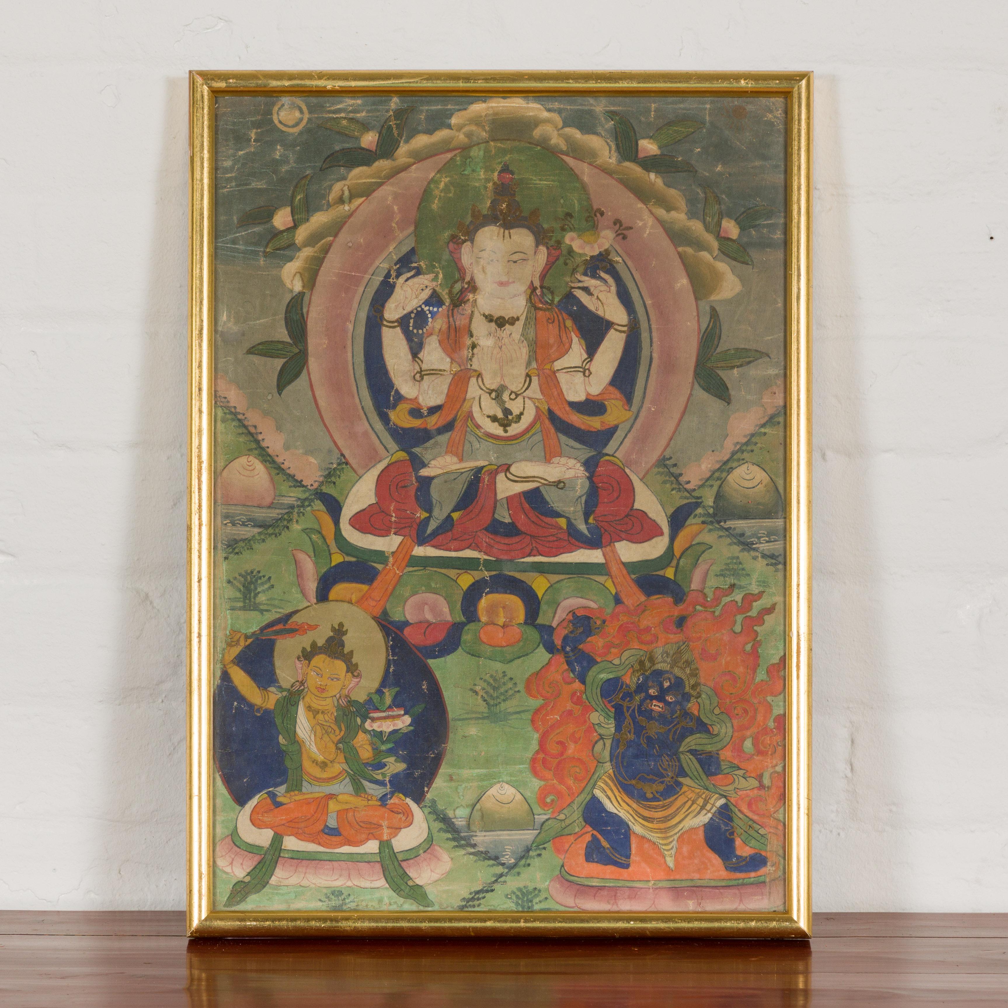 A Tibetan Thangka Buddhist painting hand-painted on canvas, created for the veneration of the Three Great Bodhisattvas. Embrace the rich tradition of Tibetan Buddhism with this vibrant Thangka painting, a radiant piece of devotional art hand-painted