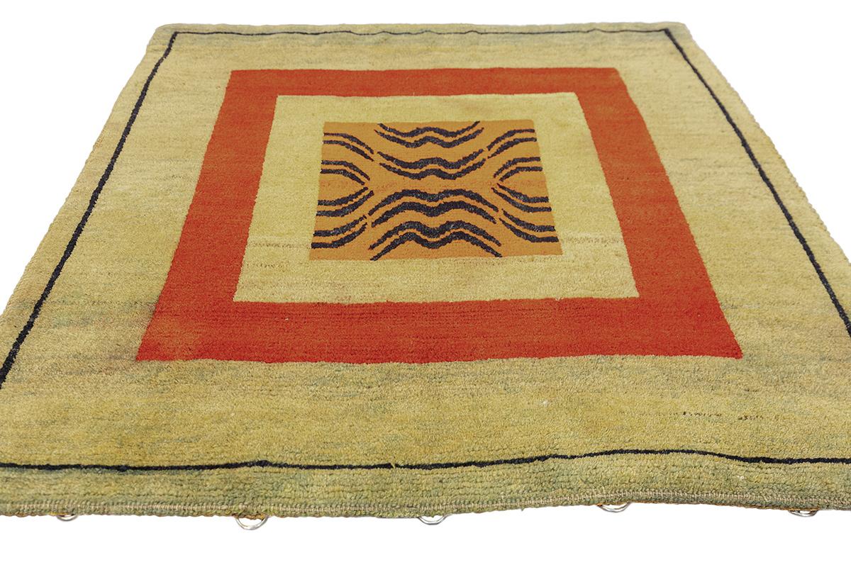 Step into the realm of the majestic with this exquisite Tibetan Tiger Rug, an emblem of strength and mysticism. Handcrafted with an eye for detail, this piece reflects a tradition steeped in symbolism and cultural significance. The tiger, revered in