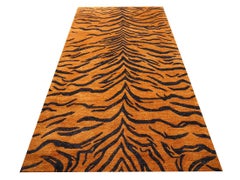 Tapis tibétain noué à la main en laine rouille et graphite de la collection Djoharian