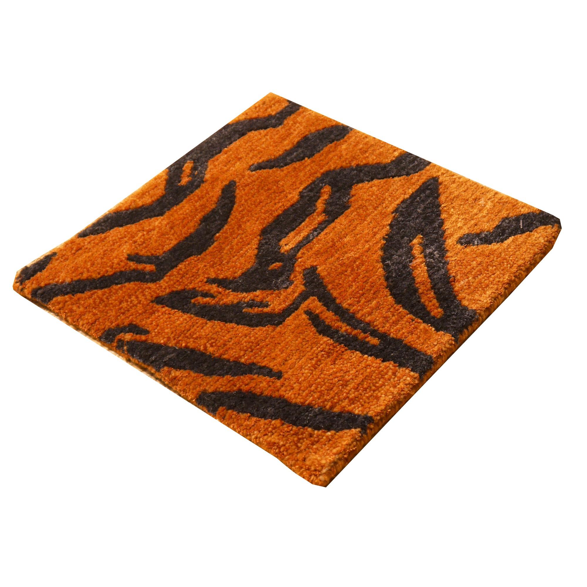 A Tibetan Tiger rug, hand knotted in Nepal, 2/3 silk and 1/3 wool pile.

=> This is a sample rug!

This particular rug is very fine in knotting and quality.

Our collection of Tibetan Tiger rugs is made in different material combinations. The
