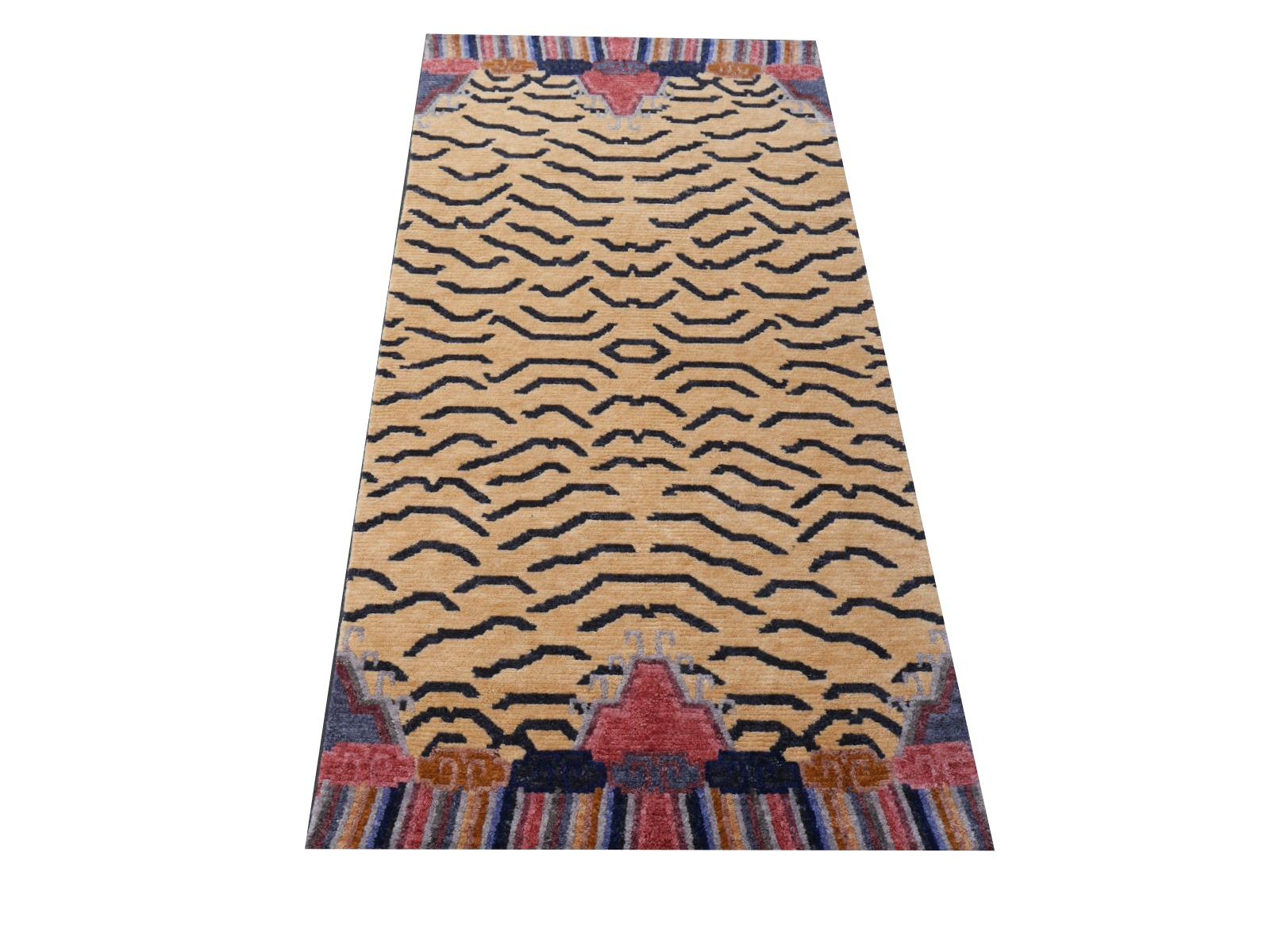 A Tibetan tiger rug, hand knotted in Nepal.

This traditional Tiger rug design is typically found on antique rugs called Khaden. It describes a small sized rug of about 3 x 6 ft that was used in Tibet to decorate columns or seat pad. Often these