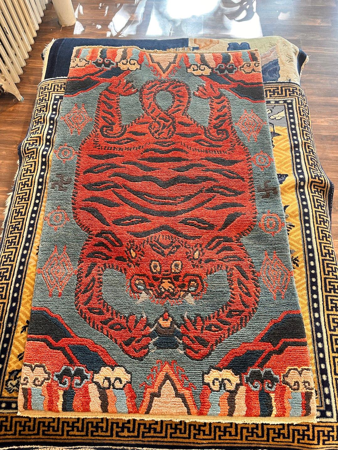 Tibetan tiger skin rug with multicolor cloud border In Good Condition For Sale In Brooklyn, NY
