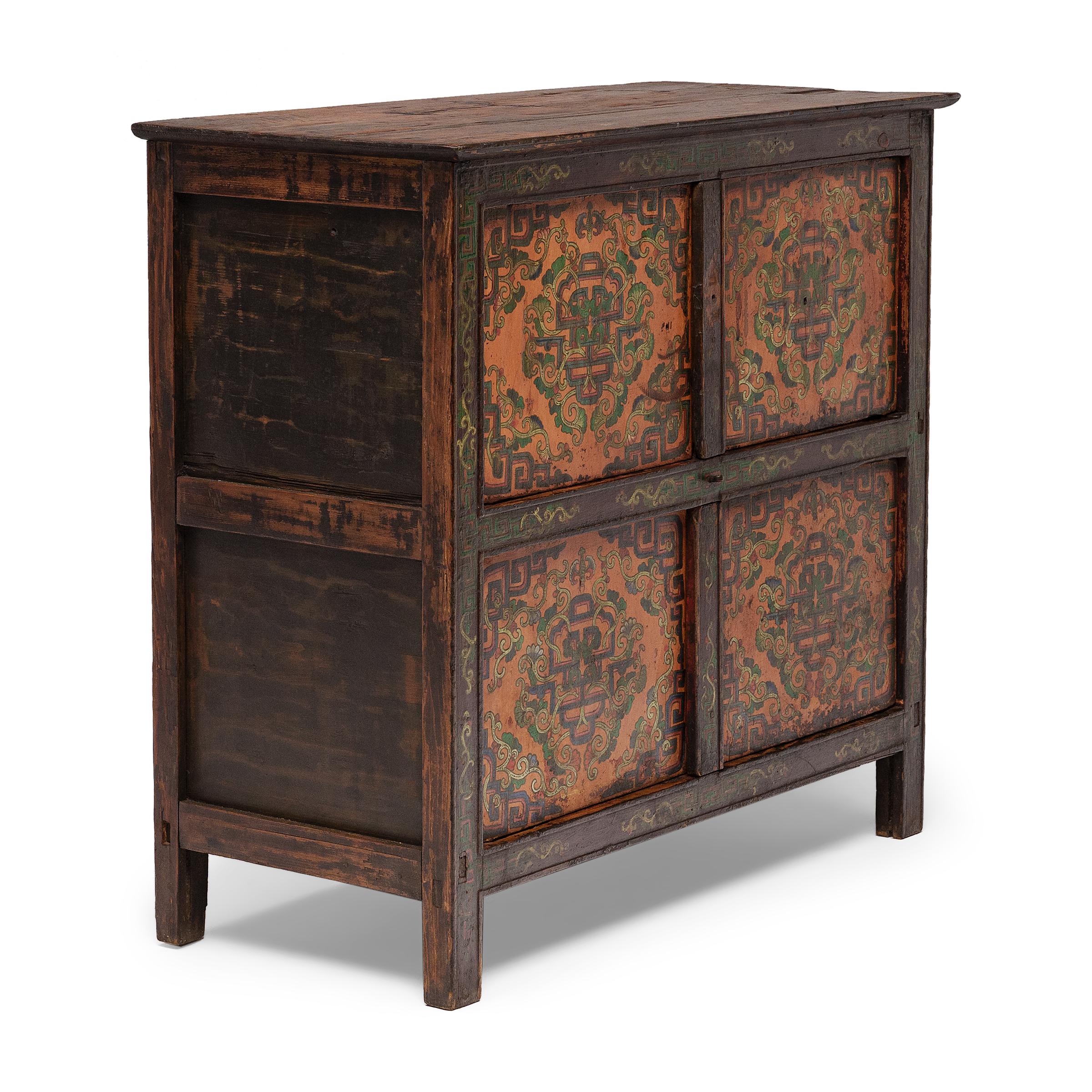Hand-Painted Tibetan Trailing Vines Cabinet, c. 1900 For Sale