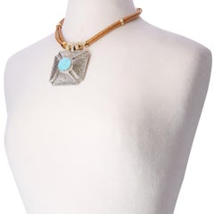 Turquoise and Sterling Silver Carved Pendant