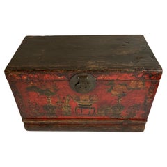 Tibetan trunk in pine with red lacquered decoration