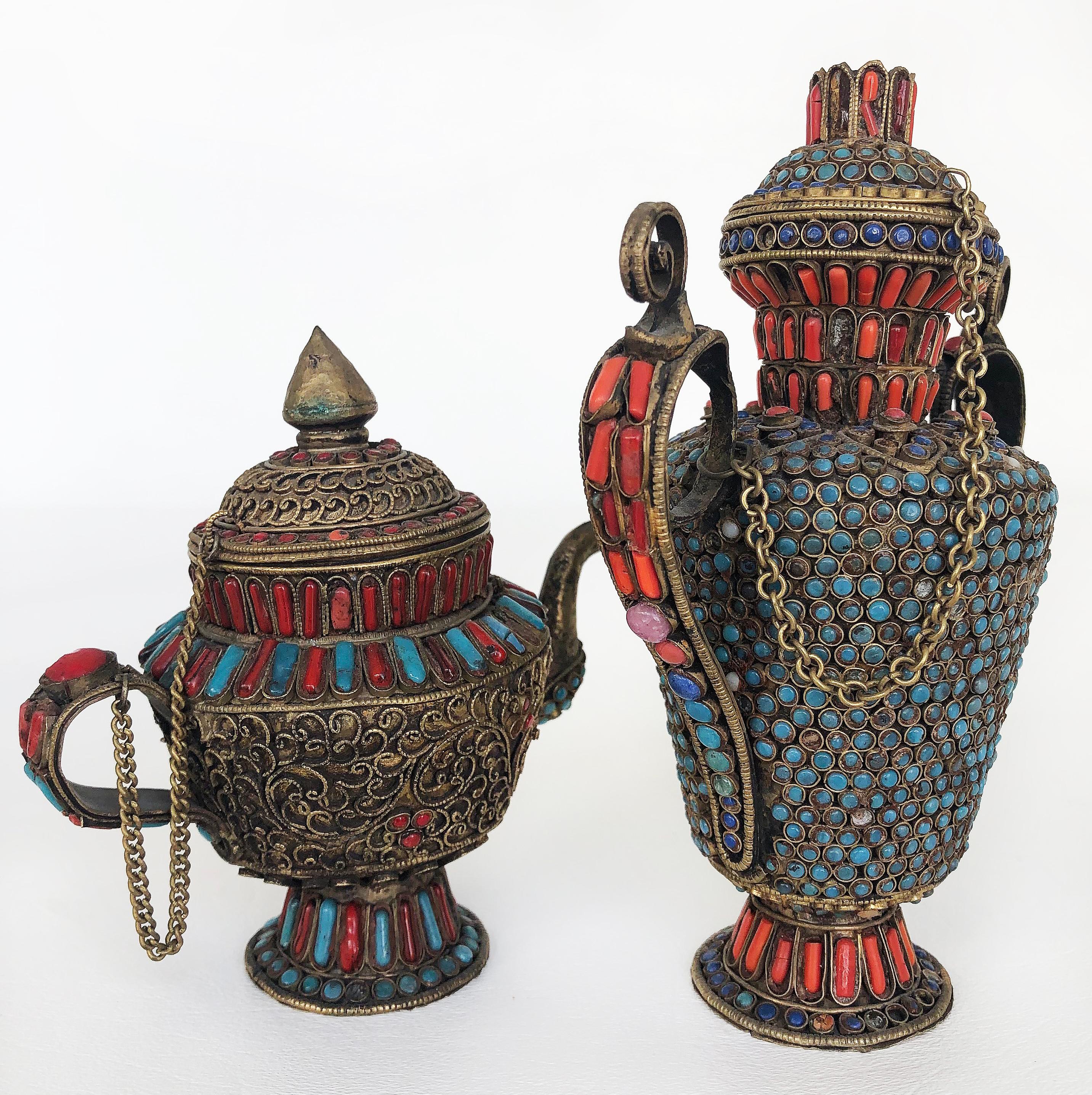 Tibetan urns, animals, Ganesh, bird in coral and turquoise, 4 pieces.


Offered for sale is a collection of 4 (FOUR) Tibetan filigree objects embellished with coral and turquoise. The grouping consists of animals, a ganesh, and covered urns. Fine
