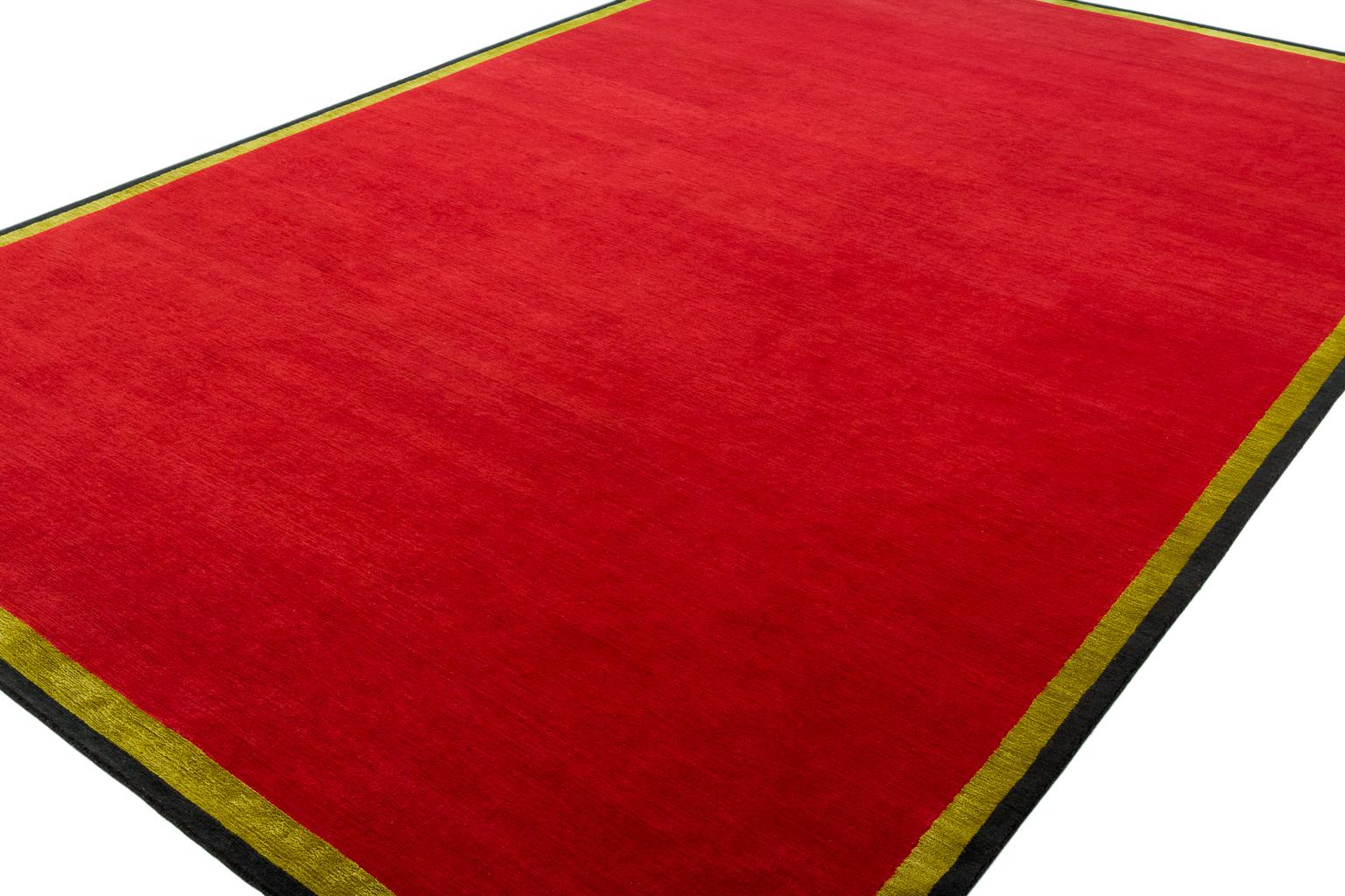 This eye-catching rug is woven using the finest Himalayan wool and Chinese silk to create a bold, luscious and durable piece.  This is an eccentric rug that was designed by Joe D’Urso for Joseph Carini. It is a very high energy colored rug and quite