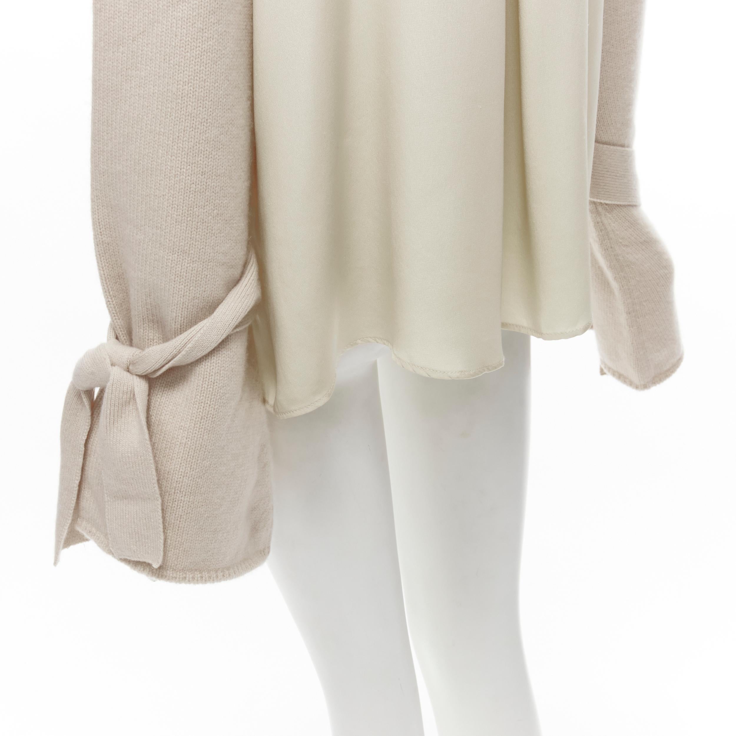 TIBI 100% cashmere beige contrast bow tie cuff oversized sweater S
Reference: YNWG/A00151
Brand: Tibi
Material: Cashmere, Silk
Color: Beige
Pattern: Solid
Closure: Pullover
Extra Details: Contrasting silk back detail.
Made in: