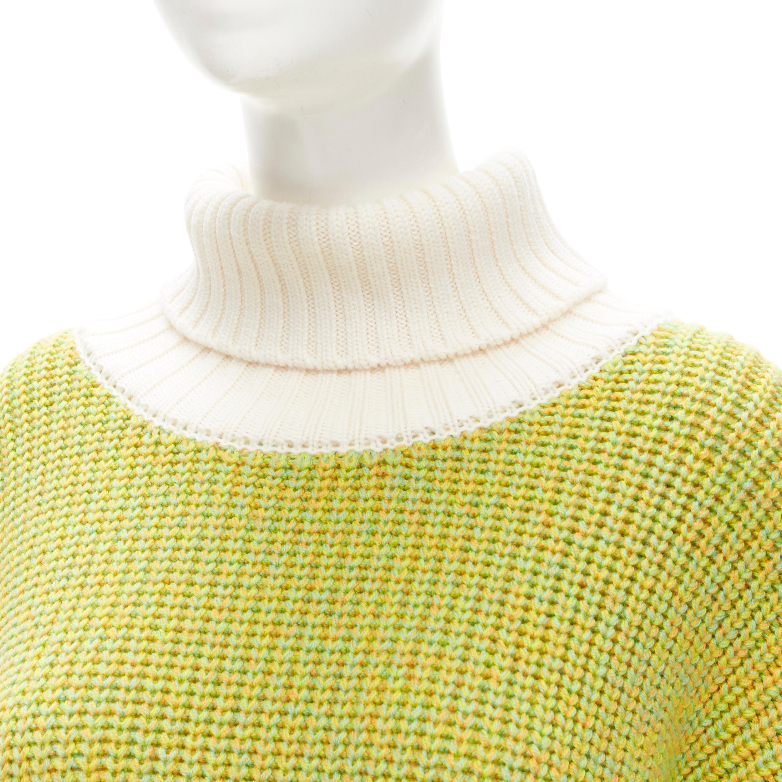 TIBI 100% merino wool lime yellow contrast rolled turtleneck sweater M/L
Brand: Tibi
Material: Merino Wool
Color: Green
Pattern: Solid
Extra Detail: Rolled turtleneck. Dropped shoulder. Very oversized fit.
Made in: China

CONDITION:
Condition: