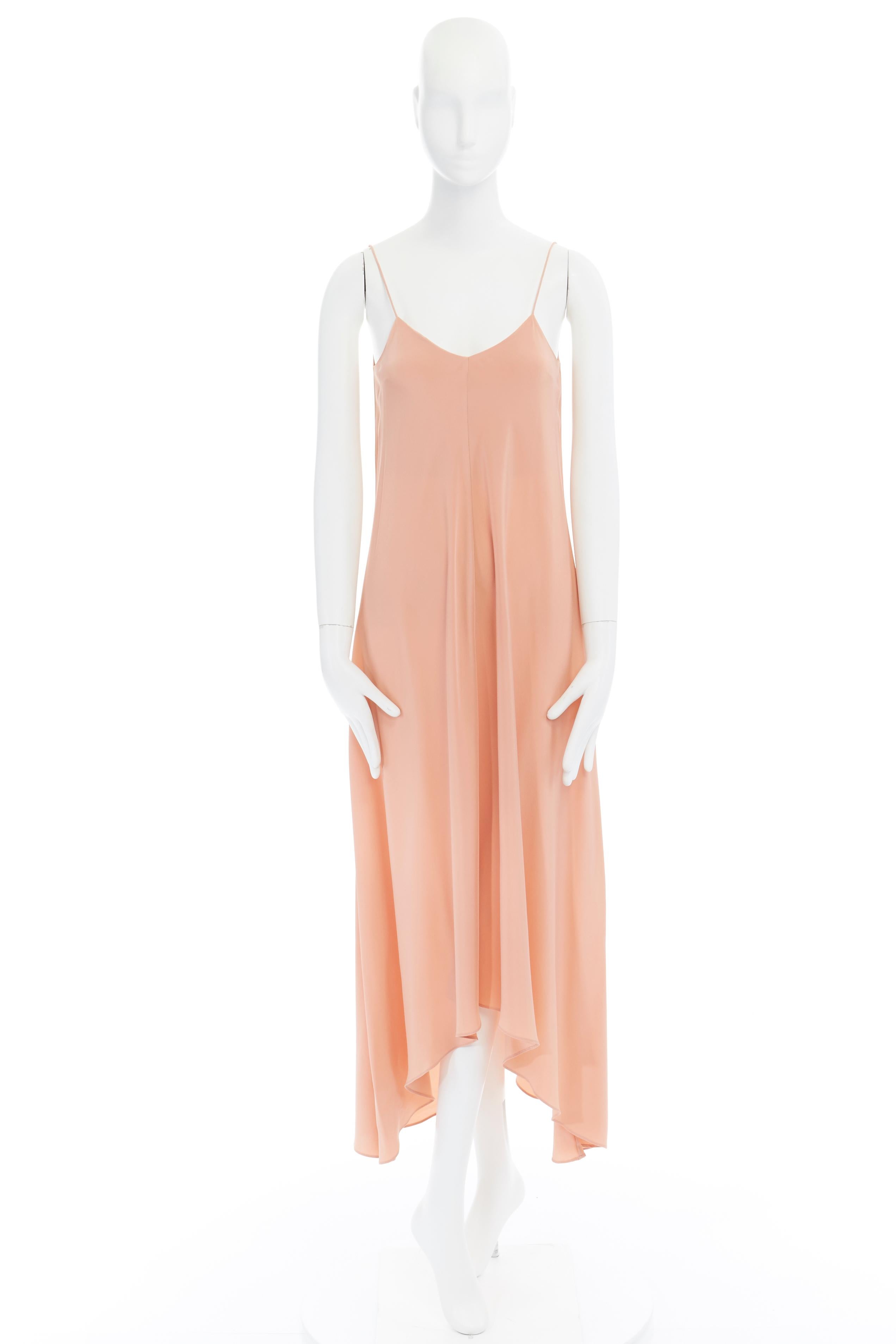 TIBI 100% silk salmon pink nude V-neck spaghetti strap high low slip dress US0 
Reference: LNKO/A00763 
Brand: Tibi 
Material: Silk 
Color: Pink 
Pattern: Solid 
Extra Detail: Fully lined. 
Made in: China 

CONDITION: 
Condition: Very good, this