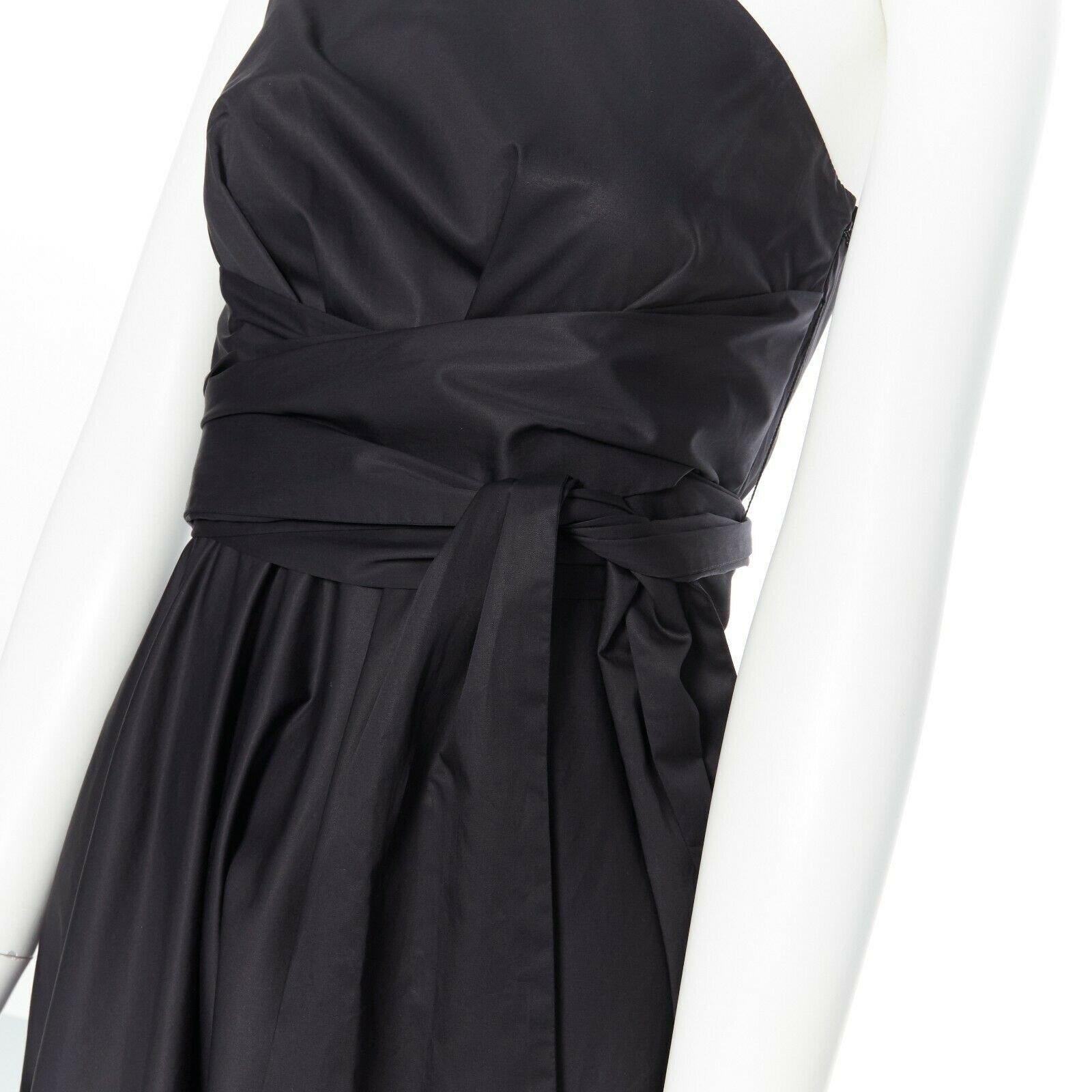 TIBI black cotton fit flare dress one shoulder asymmetrical pleat skirt US0 XS 
Reference: LNKO/A01102 
Brand: Tibi 
Material: Cotton 
Color: Black 
Pattern: Solid 
Closure: Zip 
Extra Detail: Fit and flare dress. High waisted. Shawl belt. Ruche