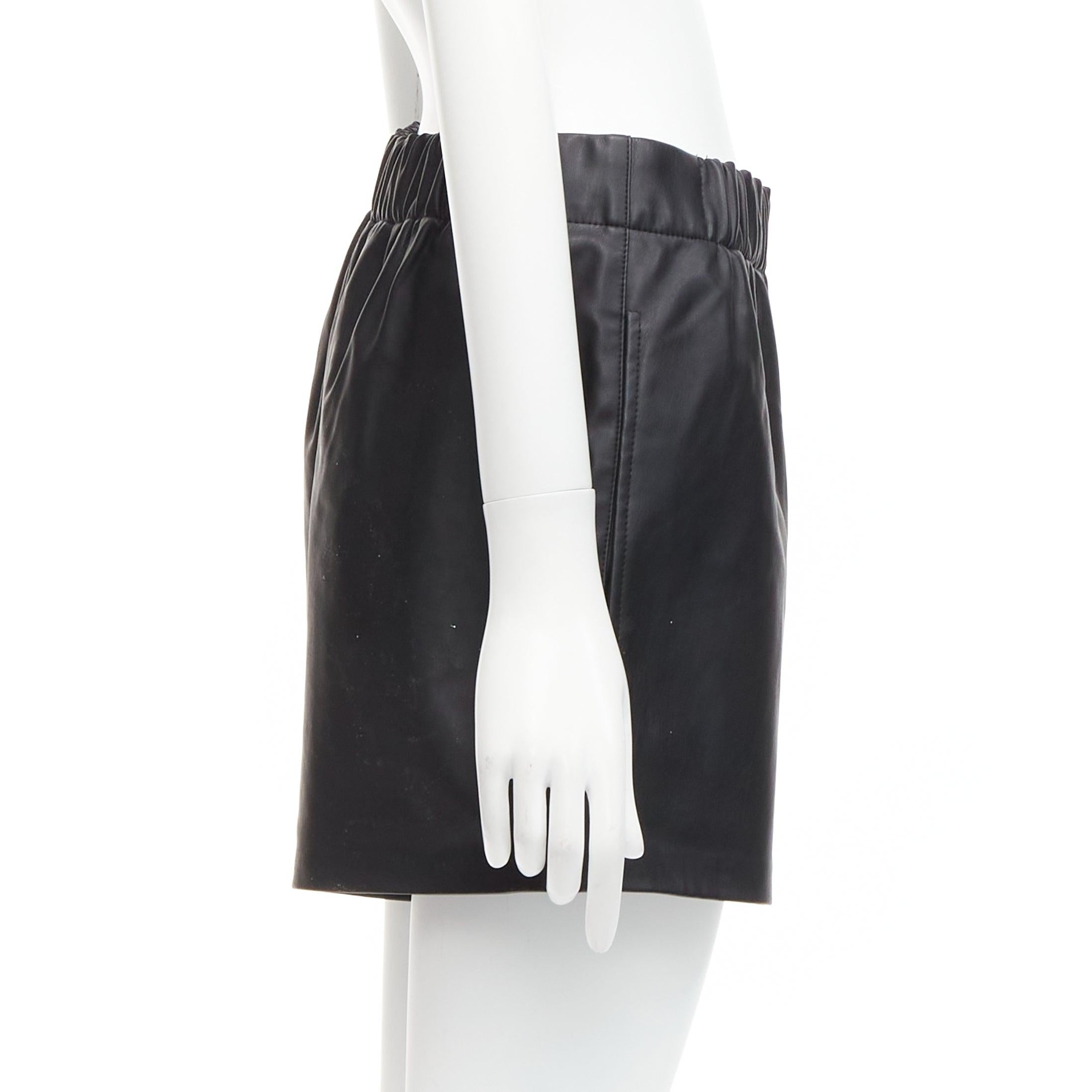 Women's TIBI black vegan leather elasticated waist pocketed mini shorts XS For Sale