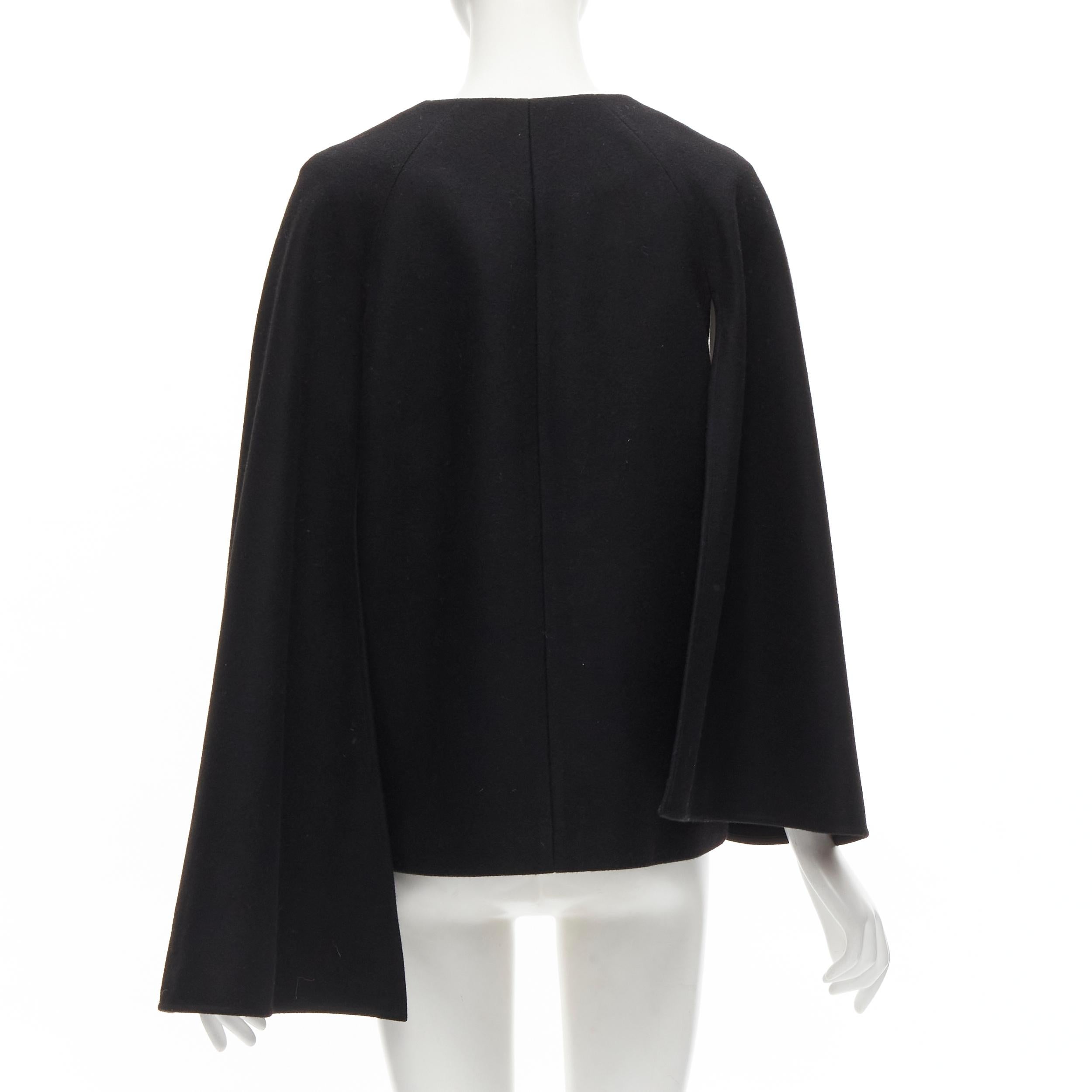 Donna TIBI giacca blazer asimmetrica in misto lana vergine nera con maniche a mantellina e bottoni S in vendita