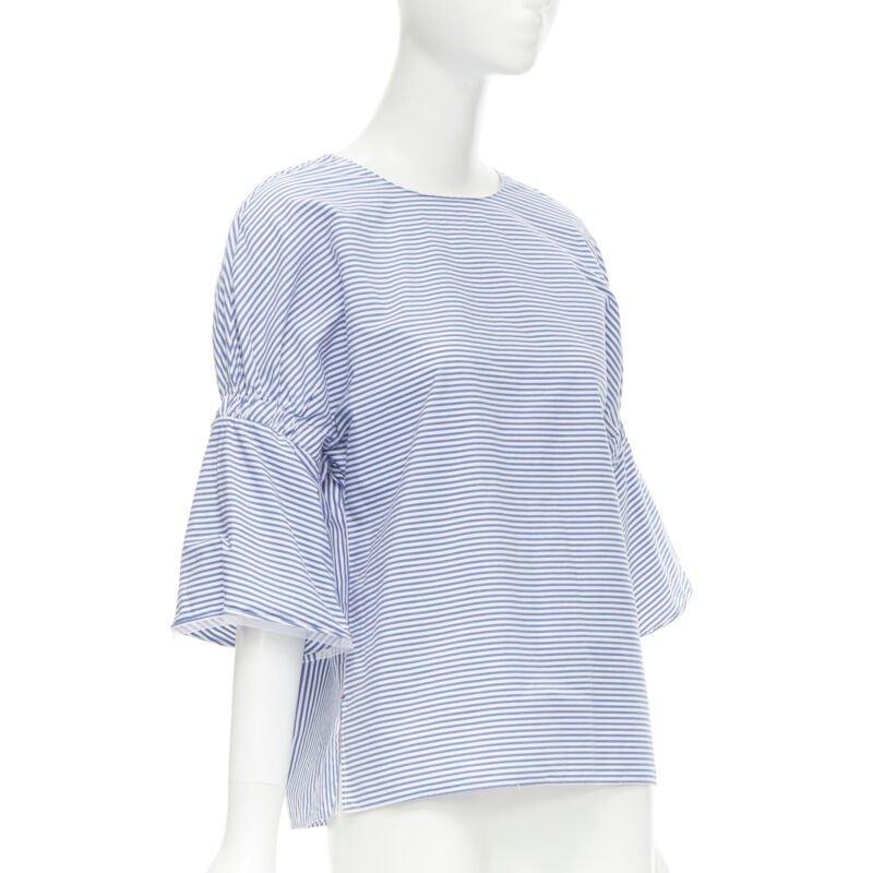 TIBI blue white striped cotton bell sleeves flared back top XS
Reference: CECU/A00011
Brand: Tibi
Material: Cotton
Color: Blue, White
Pattern: Striped
Closure: Zip
Extra Details: White mesh trimmed along sleeves.
Made in: