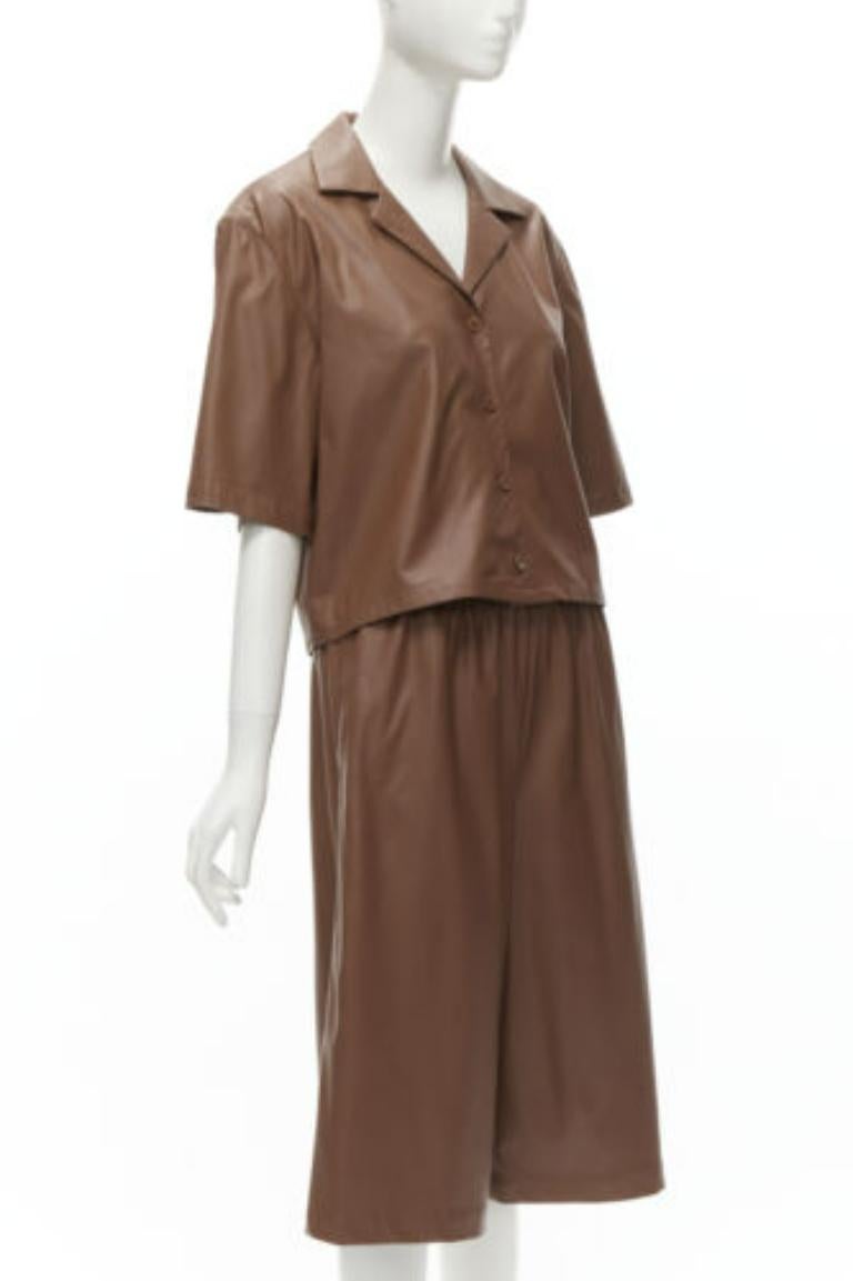 TIBI brown faux leather boxy fit shirt culotte wide shorts S
Reference: YNWG/A00116
Brand: Tibi
Material: Faux Leather
Color: Brown
Pattern: Solid
Closure: Button
Lining:  Fabric
Extra Details: Elasticated waistband for pants.
Made in: